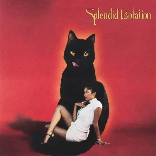 An album cover with a woman in a white dress sitting on a black cat with yellow eyes, set against a red background. The album title 'Splendid Isolation' is written in gold at the top right.
