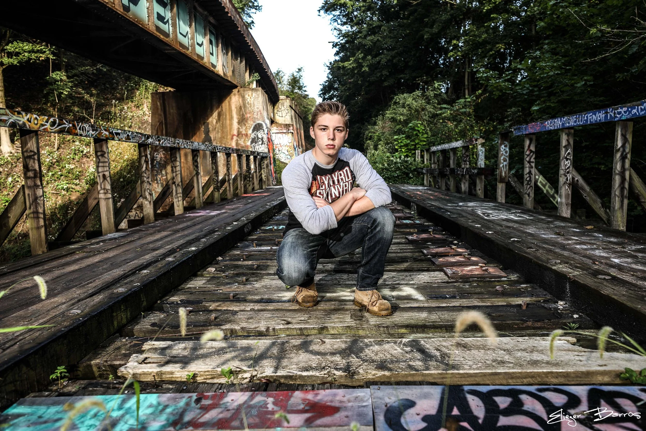 Senior pictures at Seldom Seen Greenway in Pittsburgh Beechview with historic arch and wooded trails