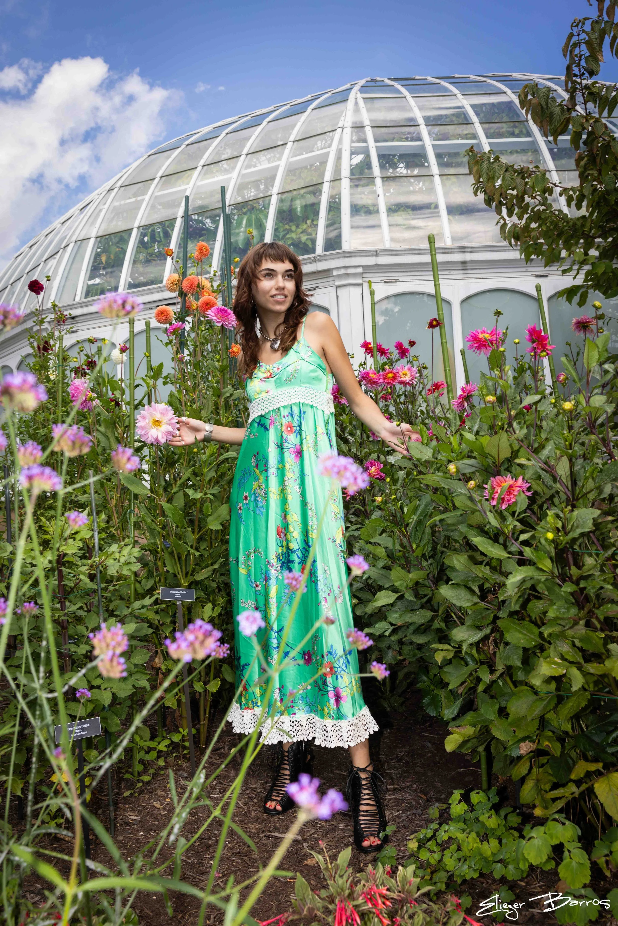 Outdoor senior pictures of a young woman in beautiful garden at Pittsburgh Botanic Garden