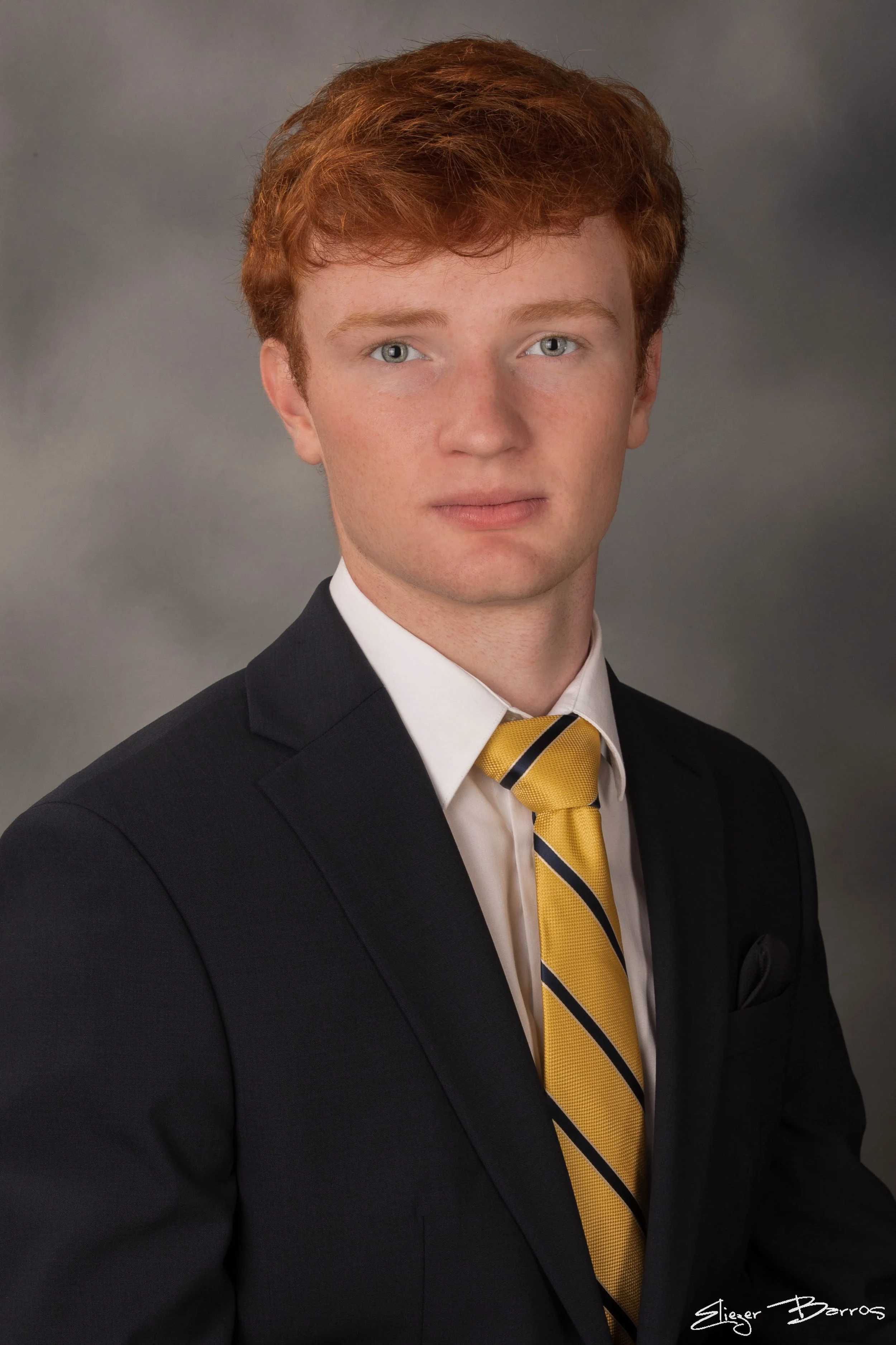 Studio senior yearbook pictures of a young man in suit Mt. Lebanon