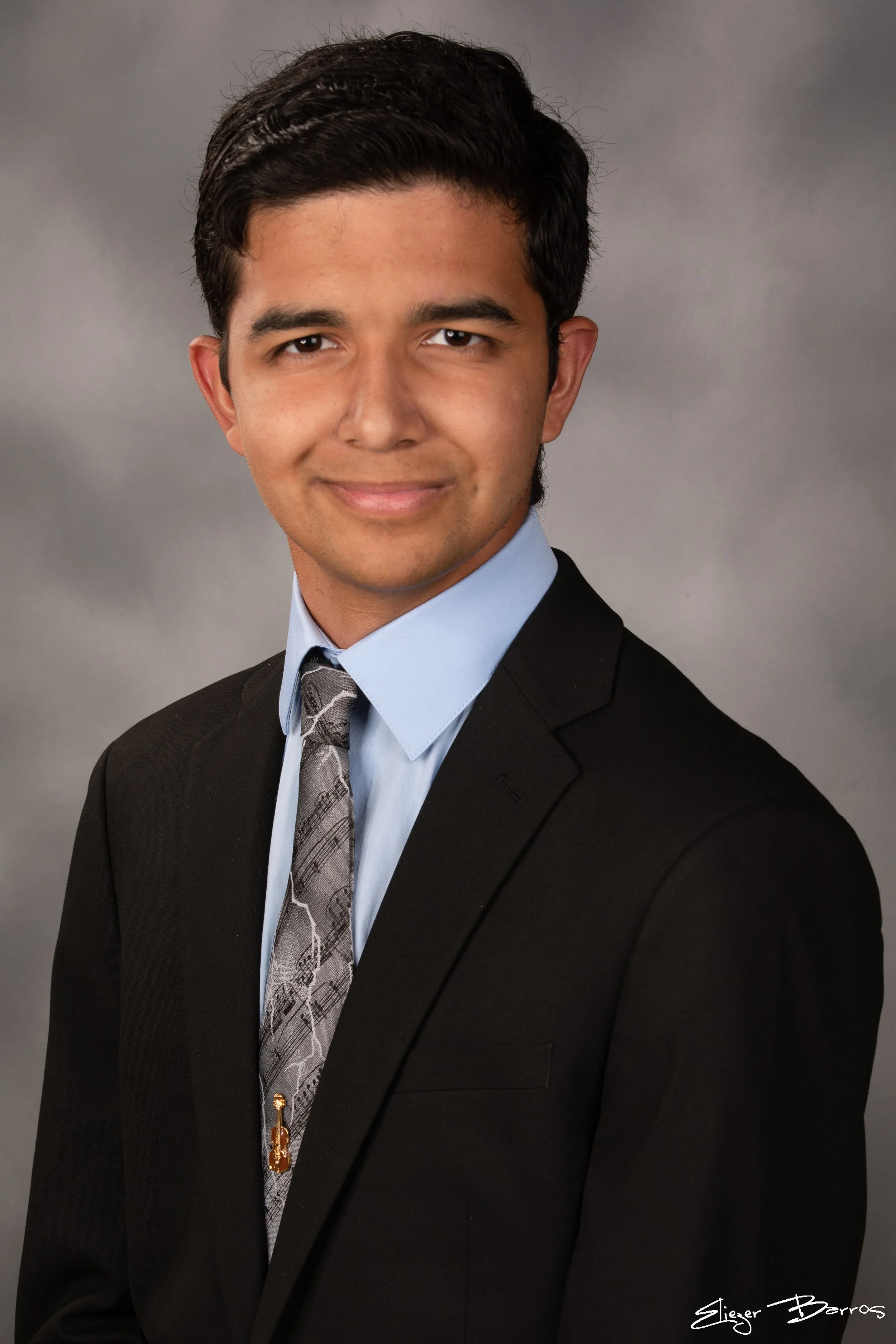 Studio senior yearbook pictures of a young man in suit Pittsburgh