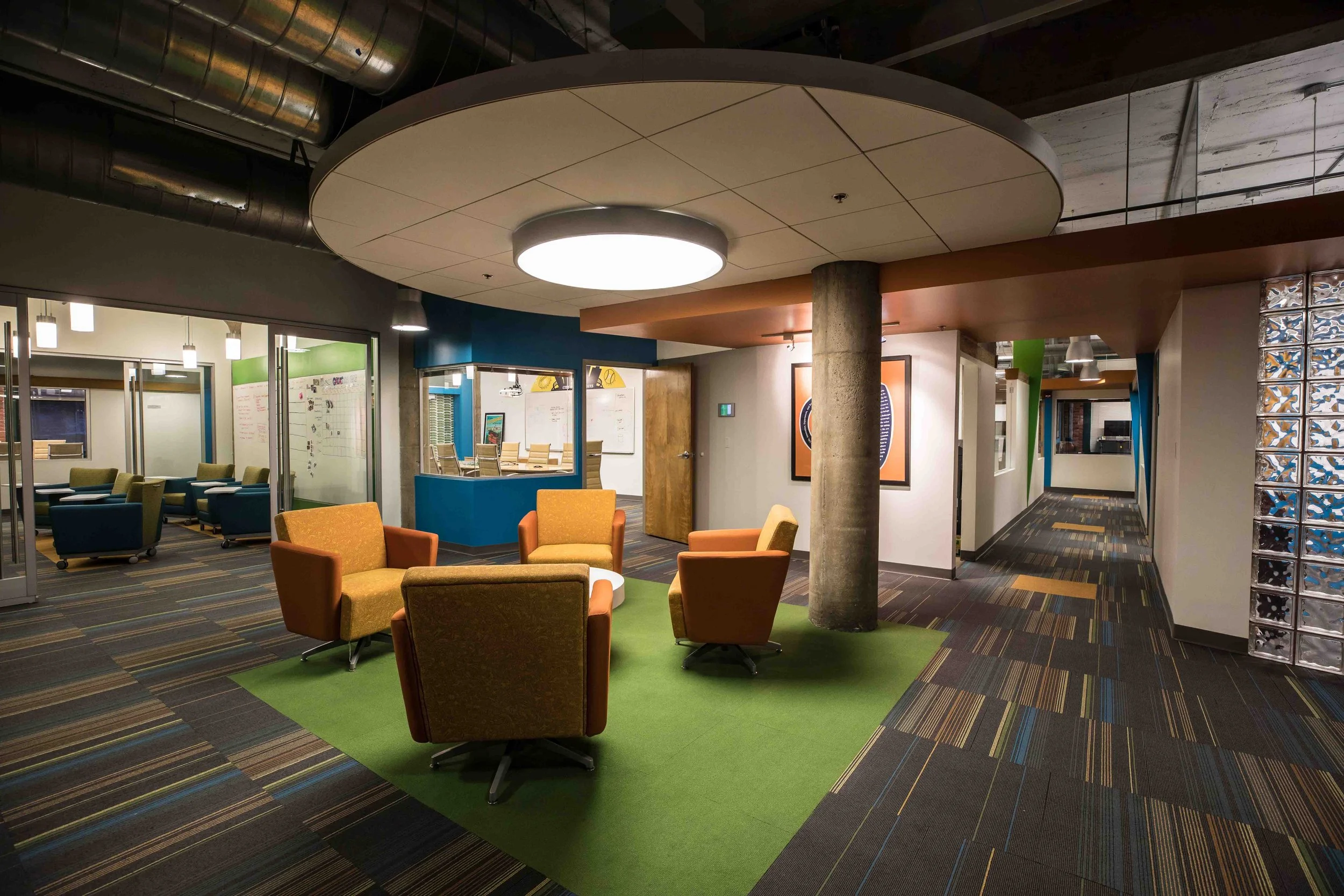 Pittsburgh modern office lounge interior architectural photography showcasing vibrant seating area and contemporary design for architects and construction companies