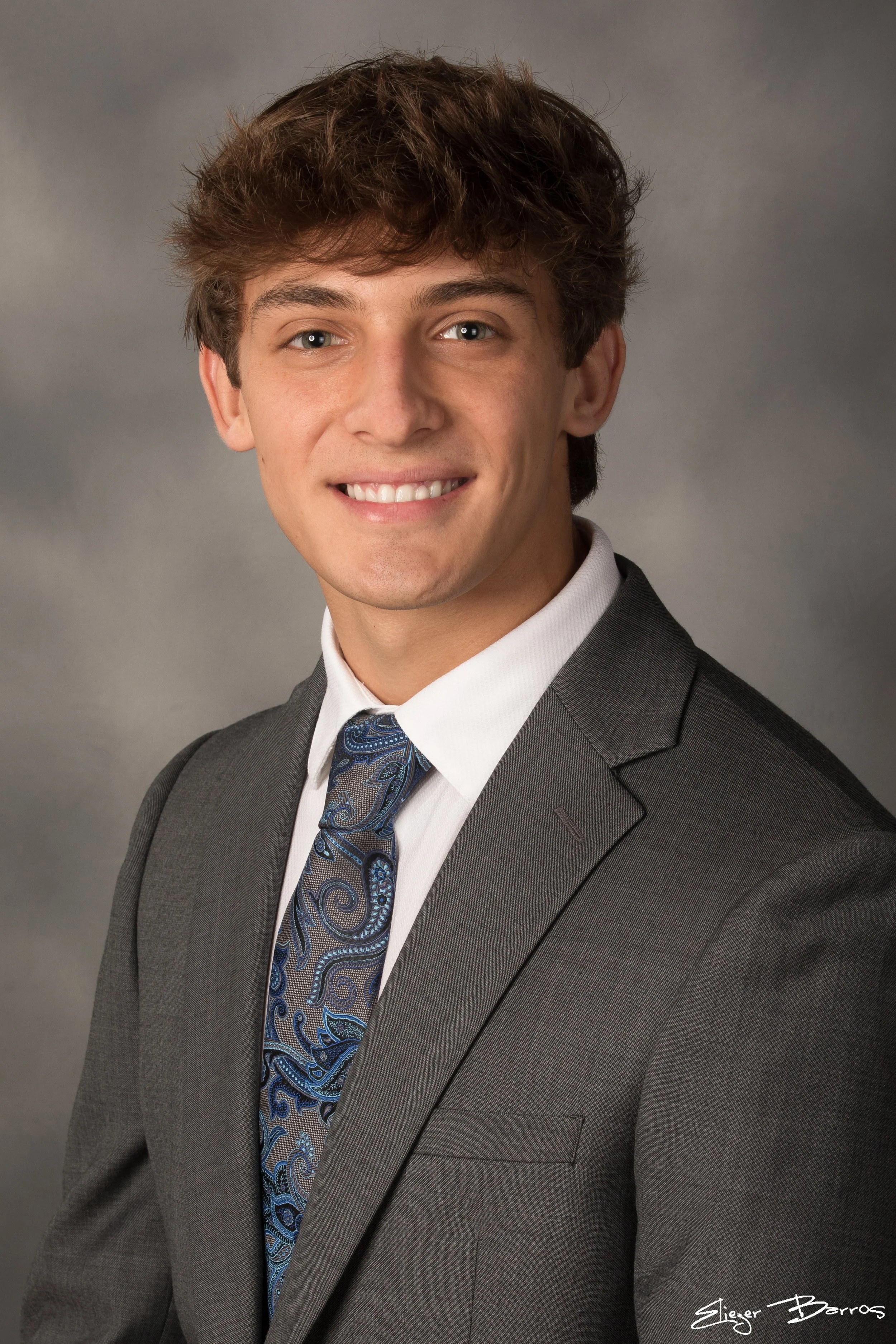 Studio senior yearbook pictures of a young man in suit Pittsburgh