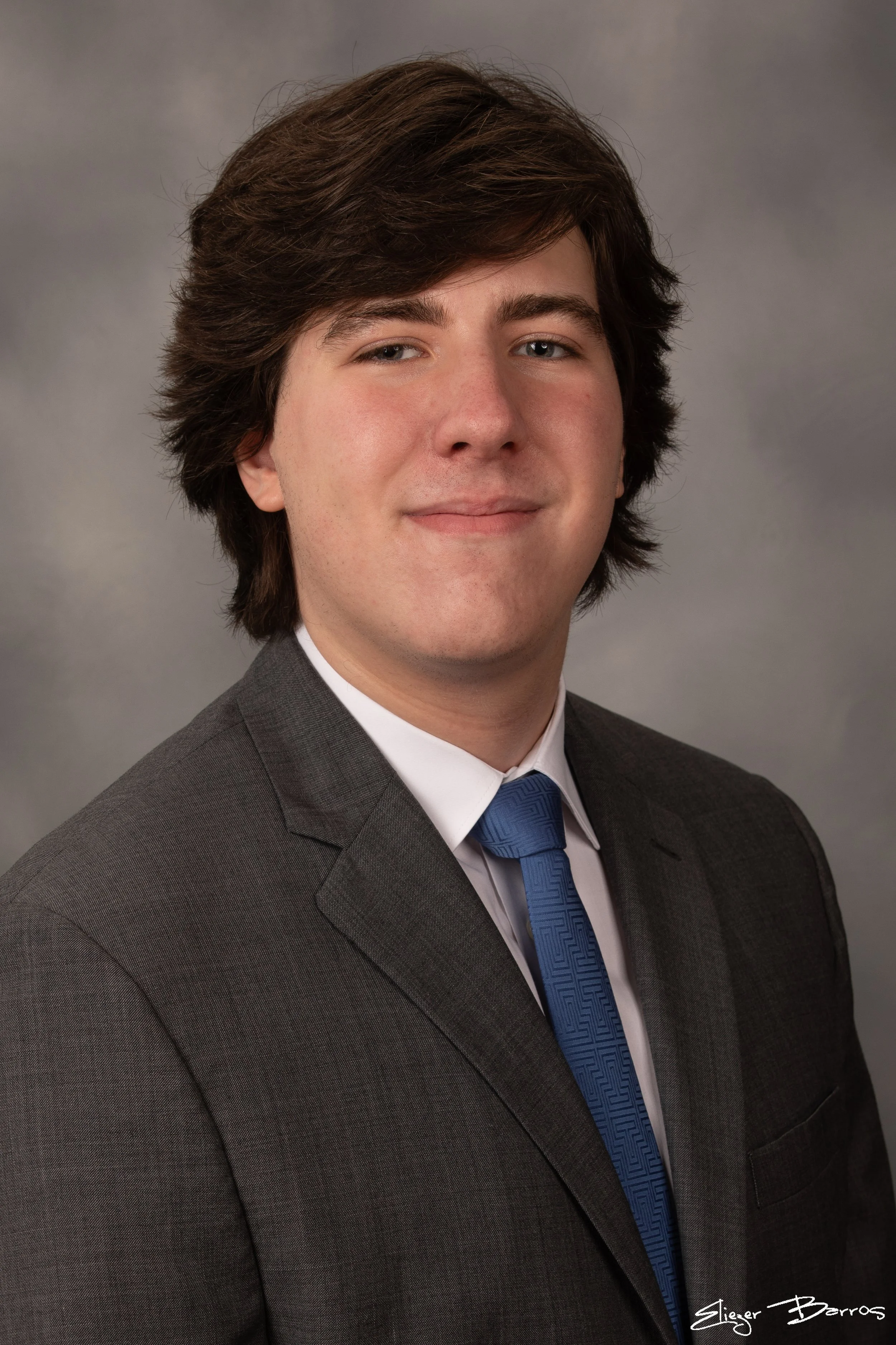 Studio senior yearbook pictures of a young man in suit Pittsburgh