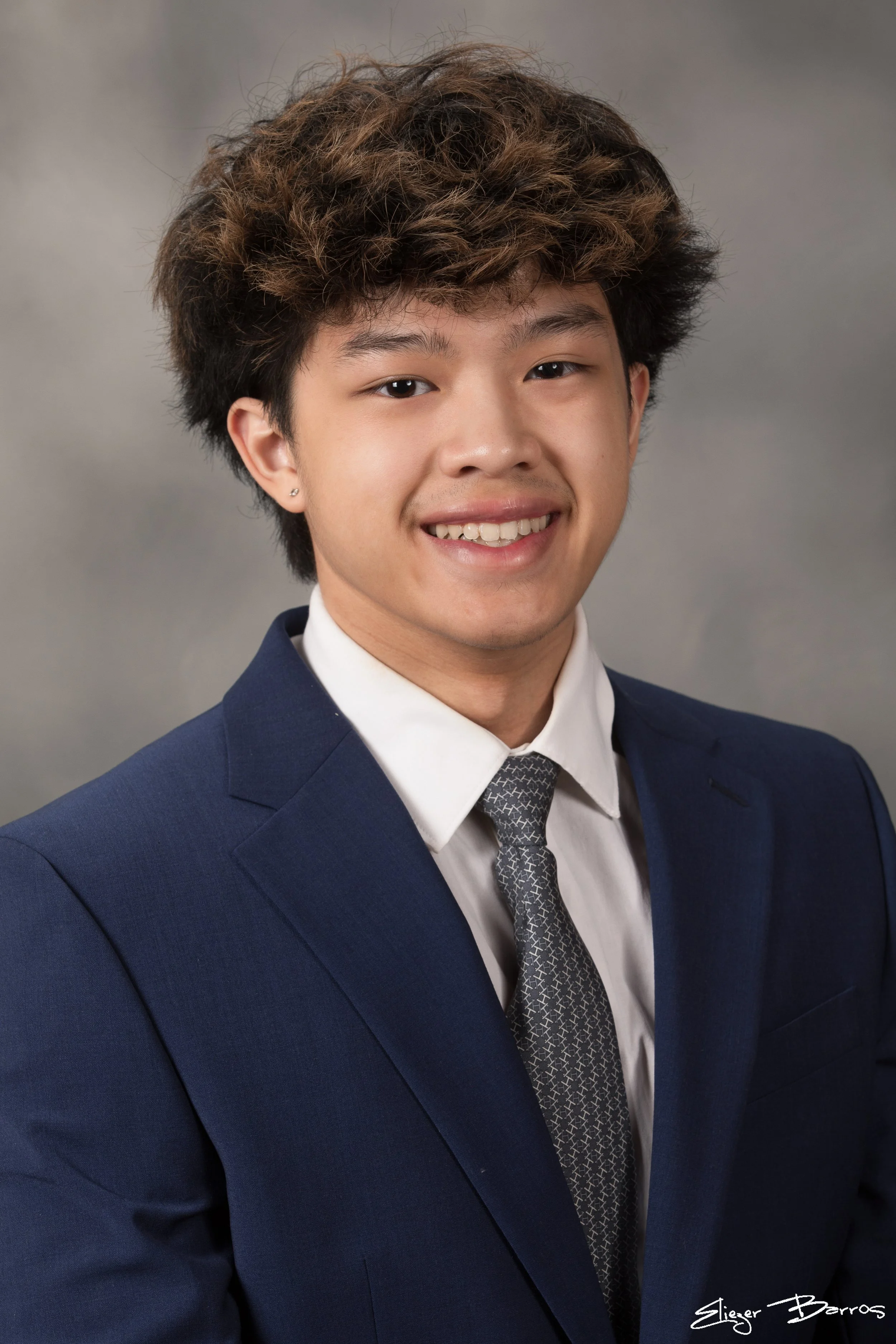 Studio senior yearbook pictures of a young man in suit Pittsburgh