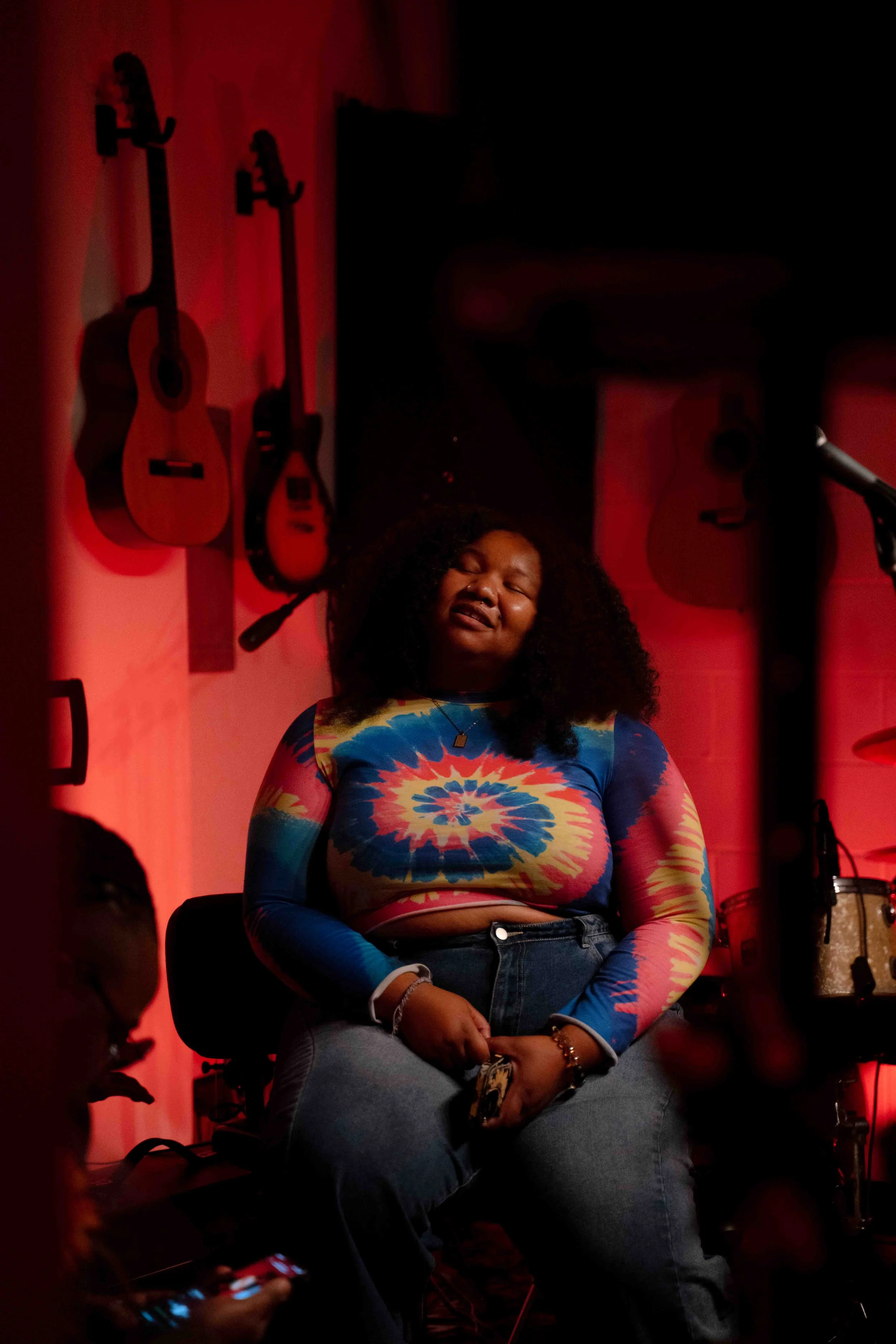Female model sitting in a chair