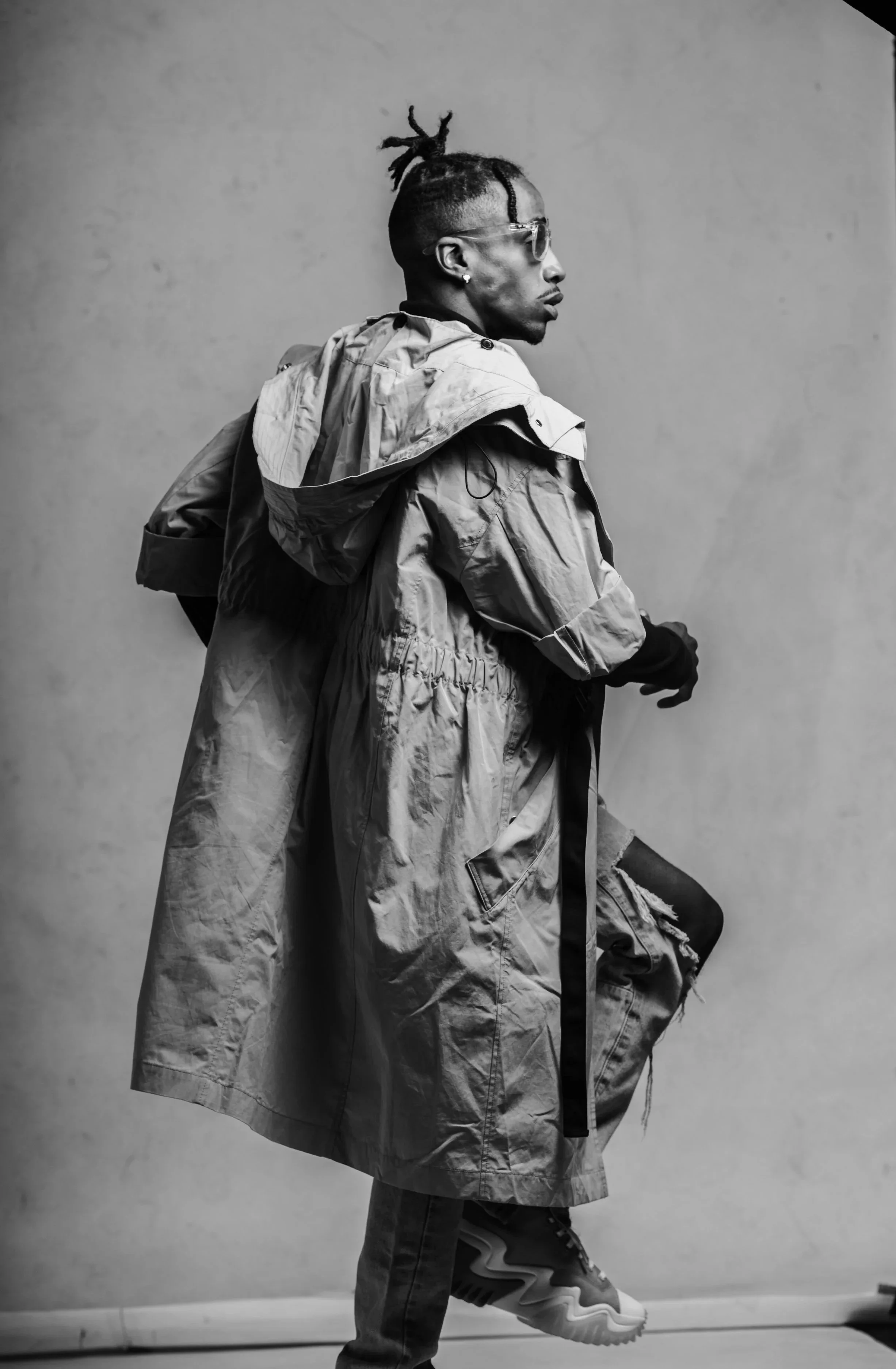 Model in black and white in a walking motion