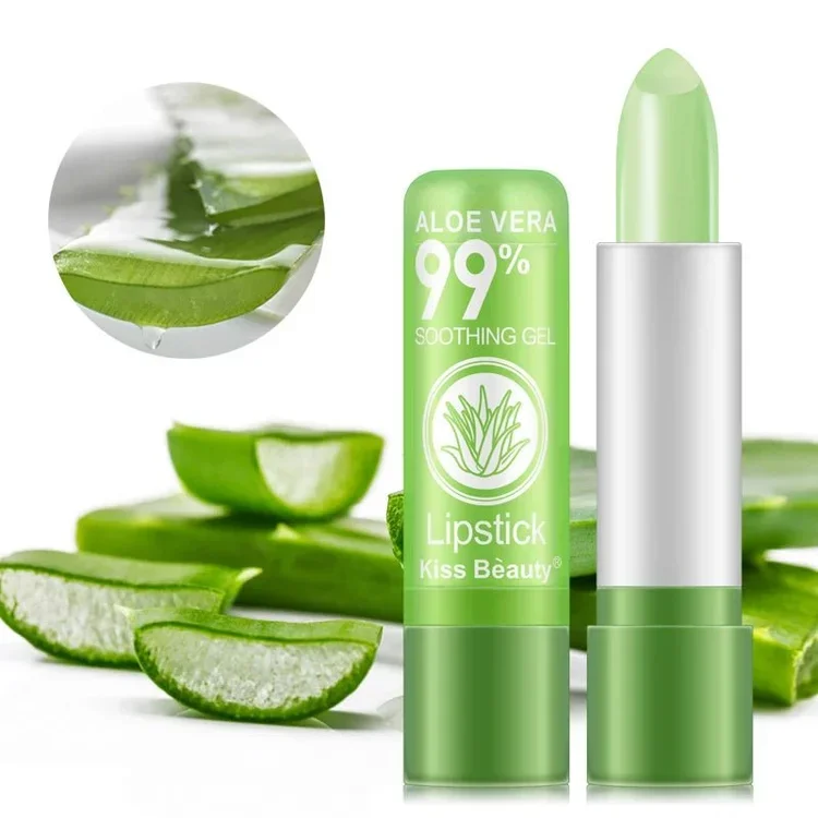 A green aloe vera soothing gel lipstick tube with a cap, displayed with aloe vera leaves and slices in the background.