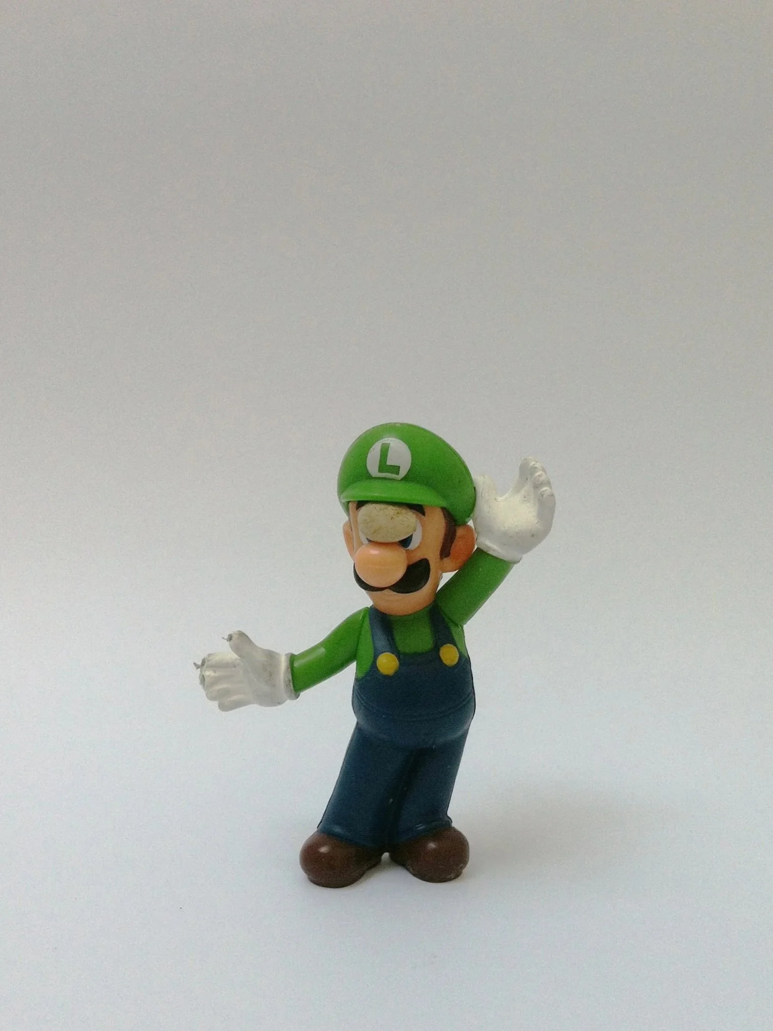 Untitled (Mudlarkin), 2014, plastic figurine, cherry pit