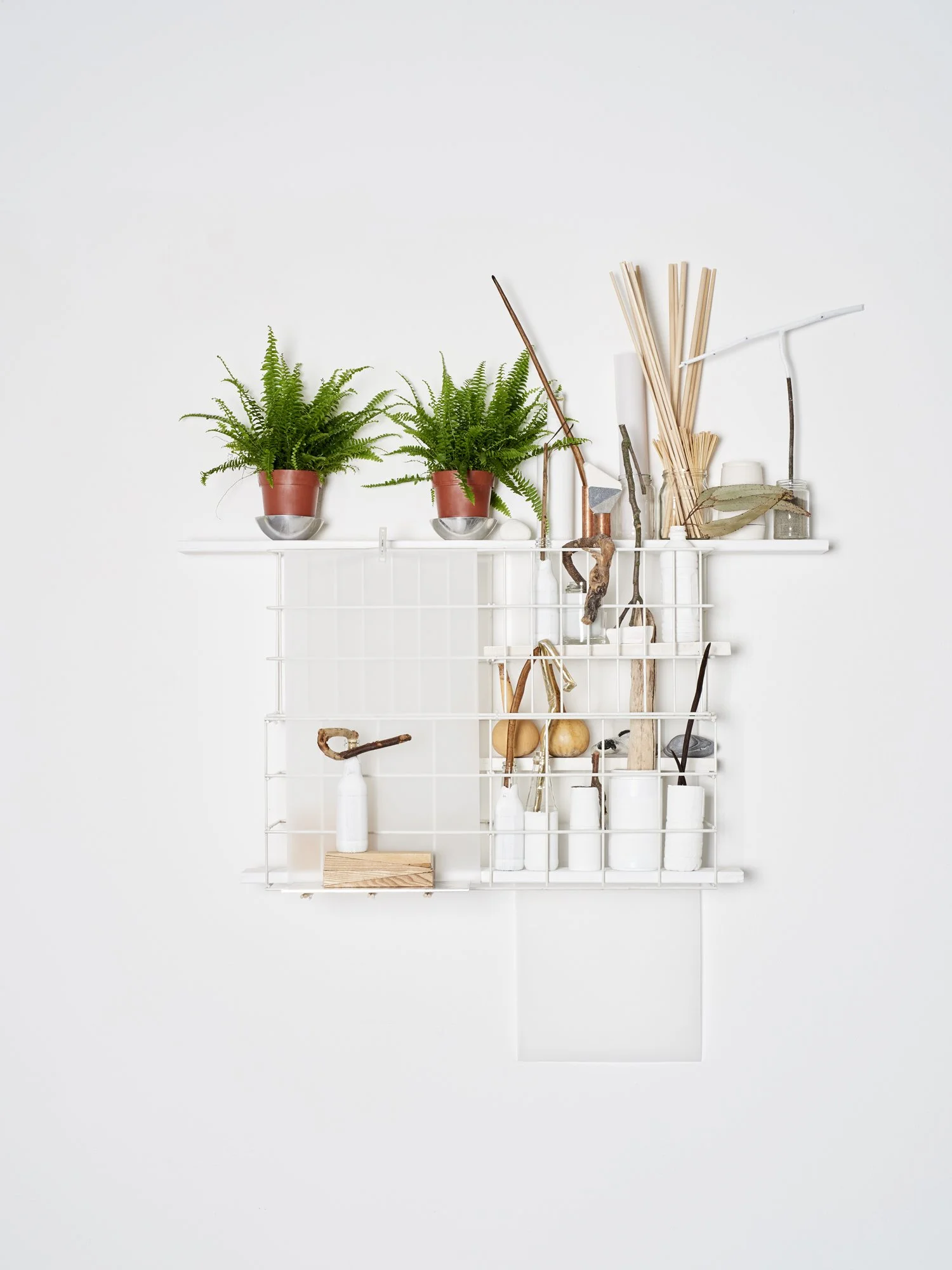 Untitled (Gridworks), 2018, Steel frame, plants, paper, paint, wood, plaster, metals, vessels, stone, clothespin, etc.