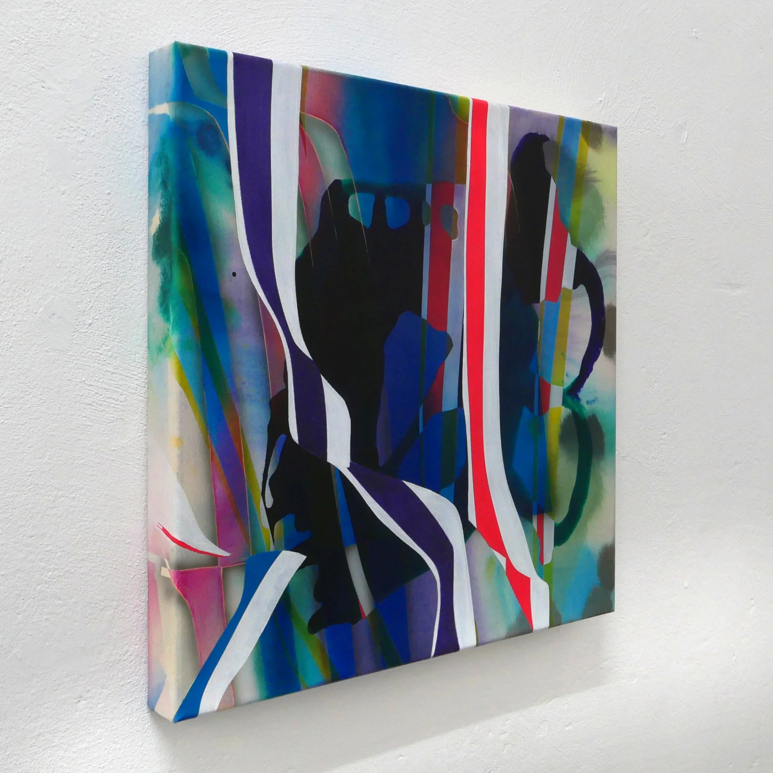 Abstract colorful painting with flowing lines and shapes, mounted on a white wall.