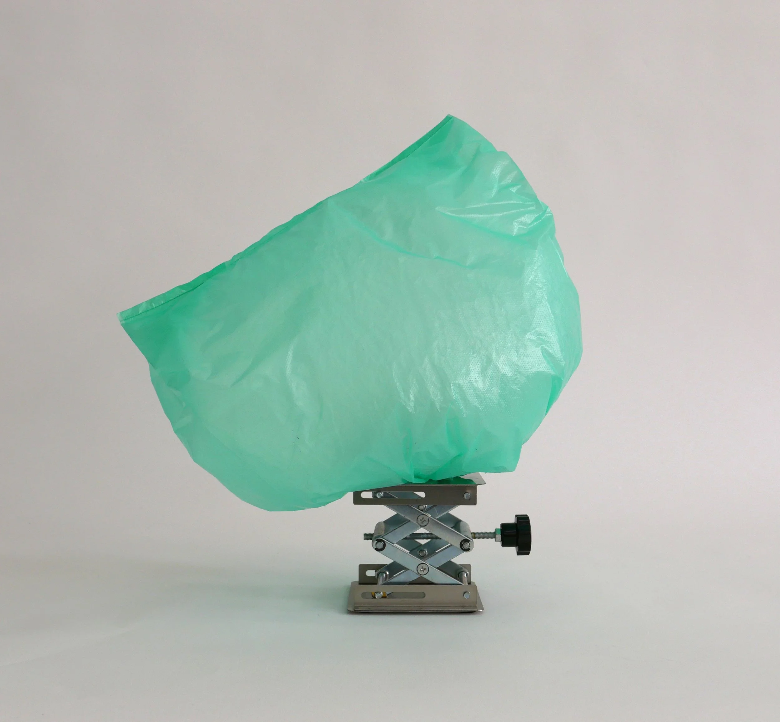 Proposal Nr. 26 (Sushimoto), 2018, Plastic bags, vehicle lift (stainless steel)