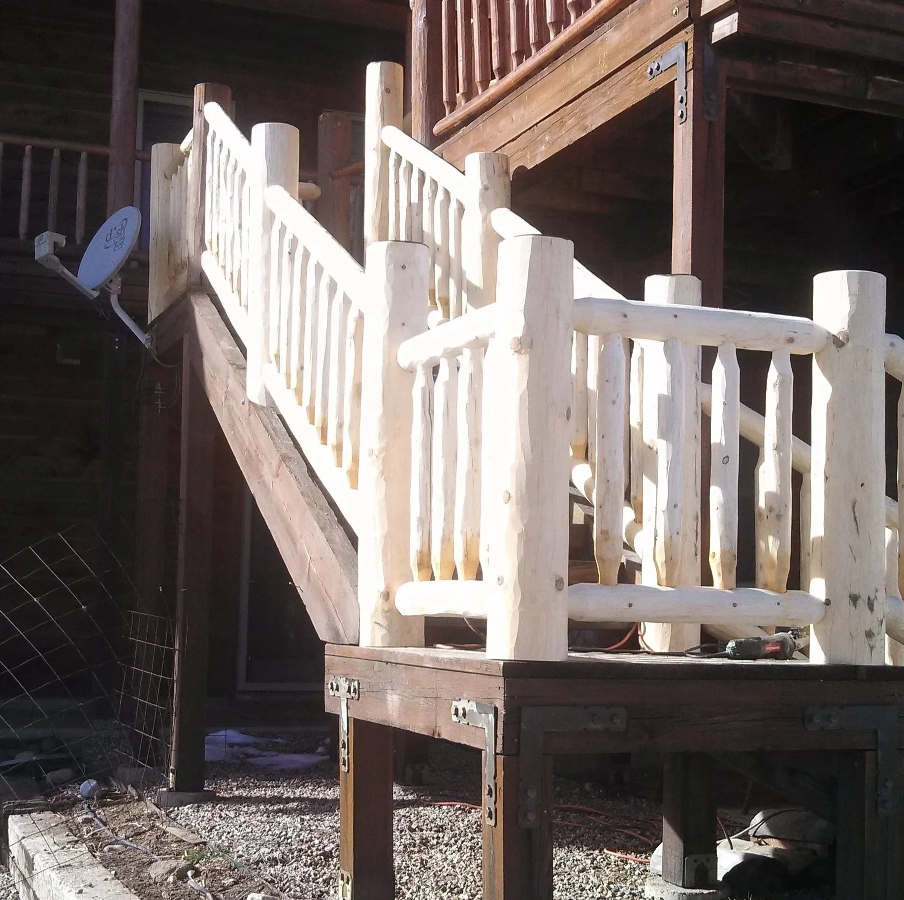 Pale logs being used to remodel staircase