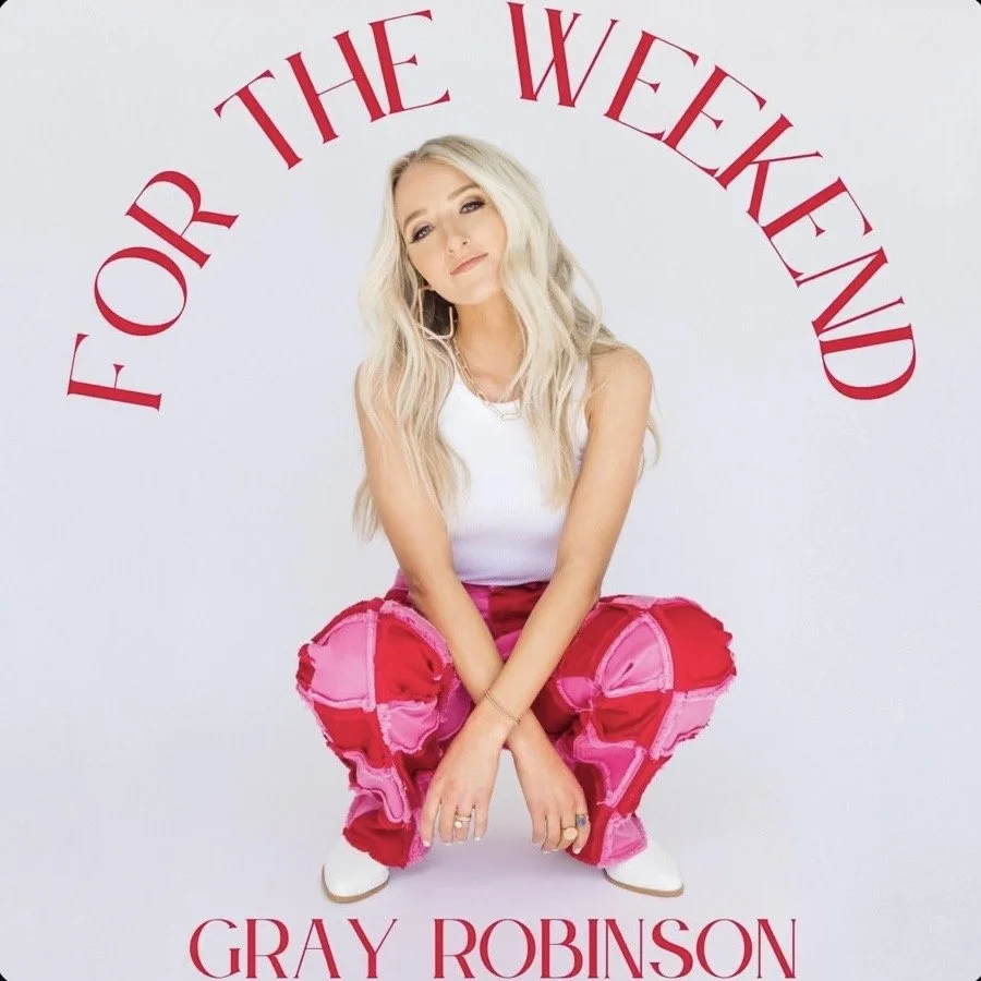 Cover art for Gray Robinson's single "For the Weekend," featuring Gray Robinson in white tank top and pink patchwork pants, squatting with hands clasped in front of her, against a white backdrop with the song title and artist's name in red arching text.