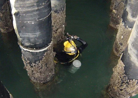 Engineer-Diver performing Level II Inspection