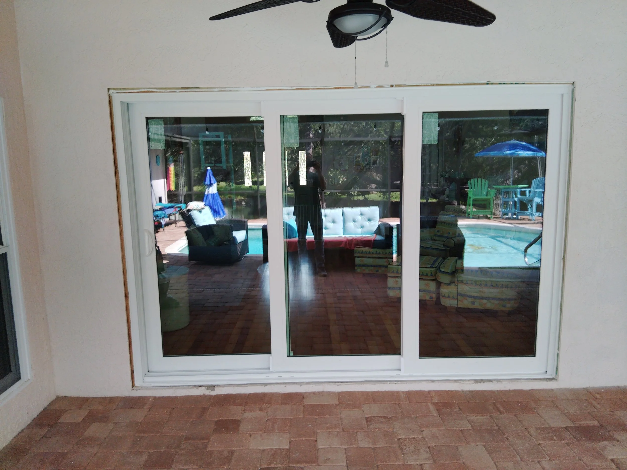 Large sliding glass door installed with proper alignment and smooth operation