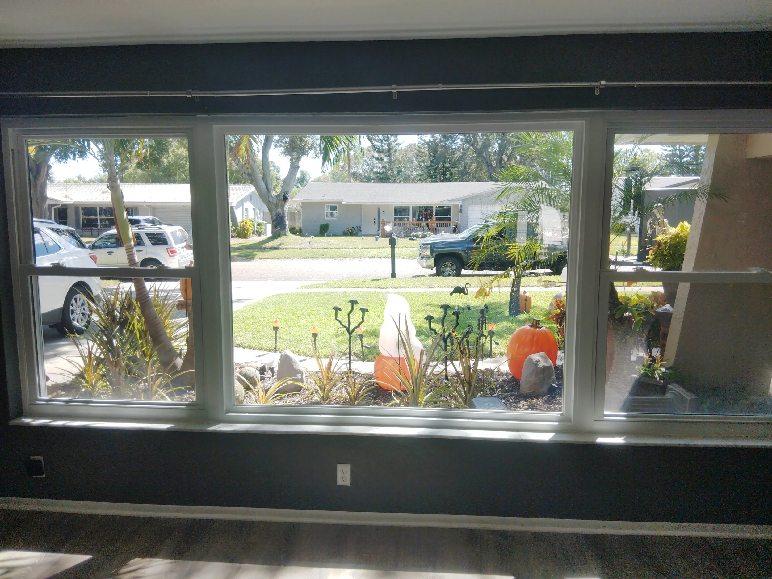 Multiple residential windows installed evenly with consistent spacing and alignment