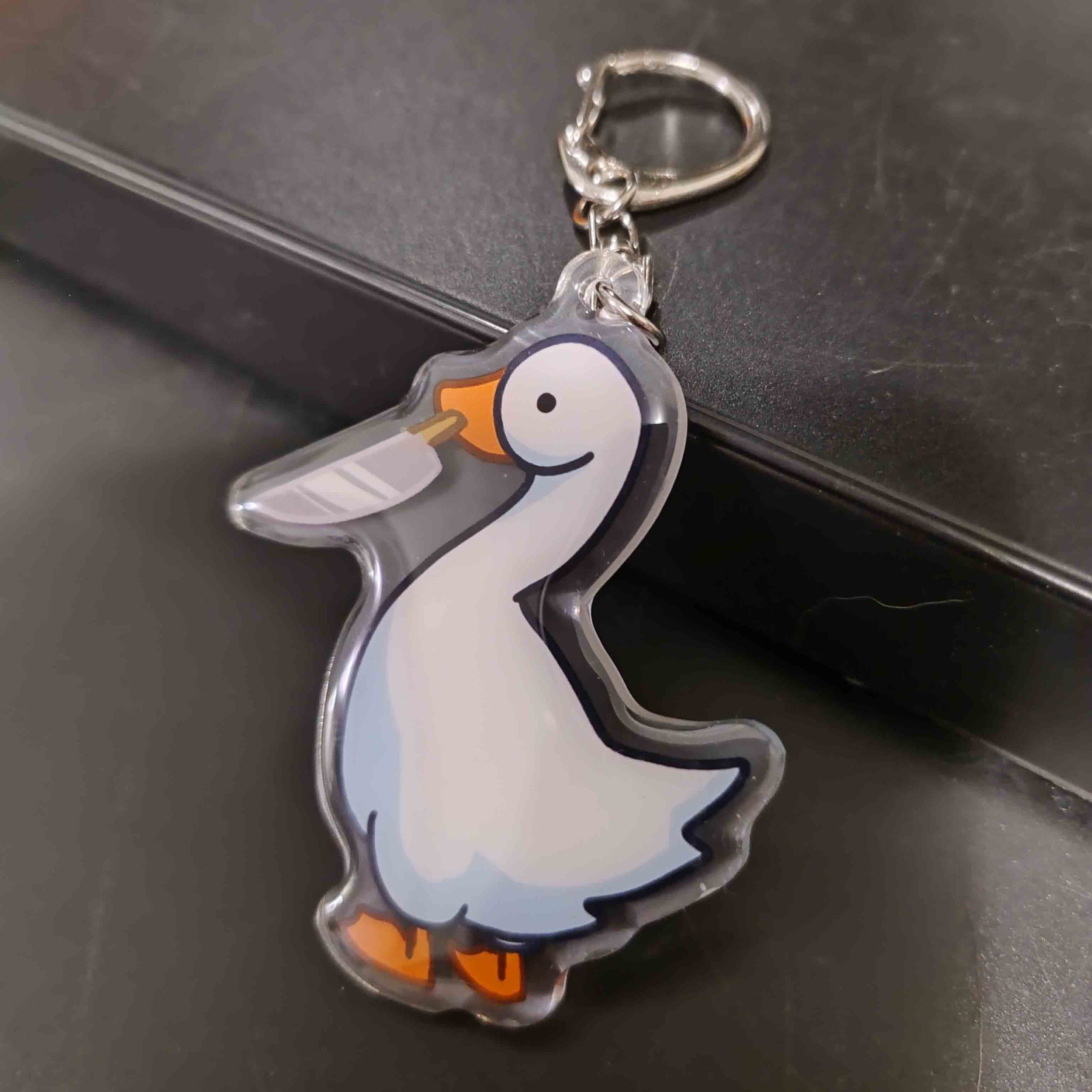 Goose with a Knife Charm