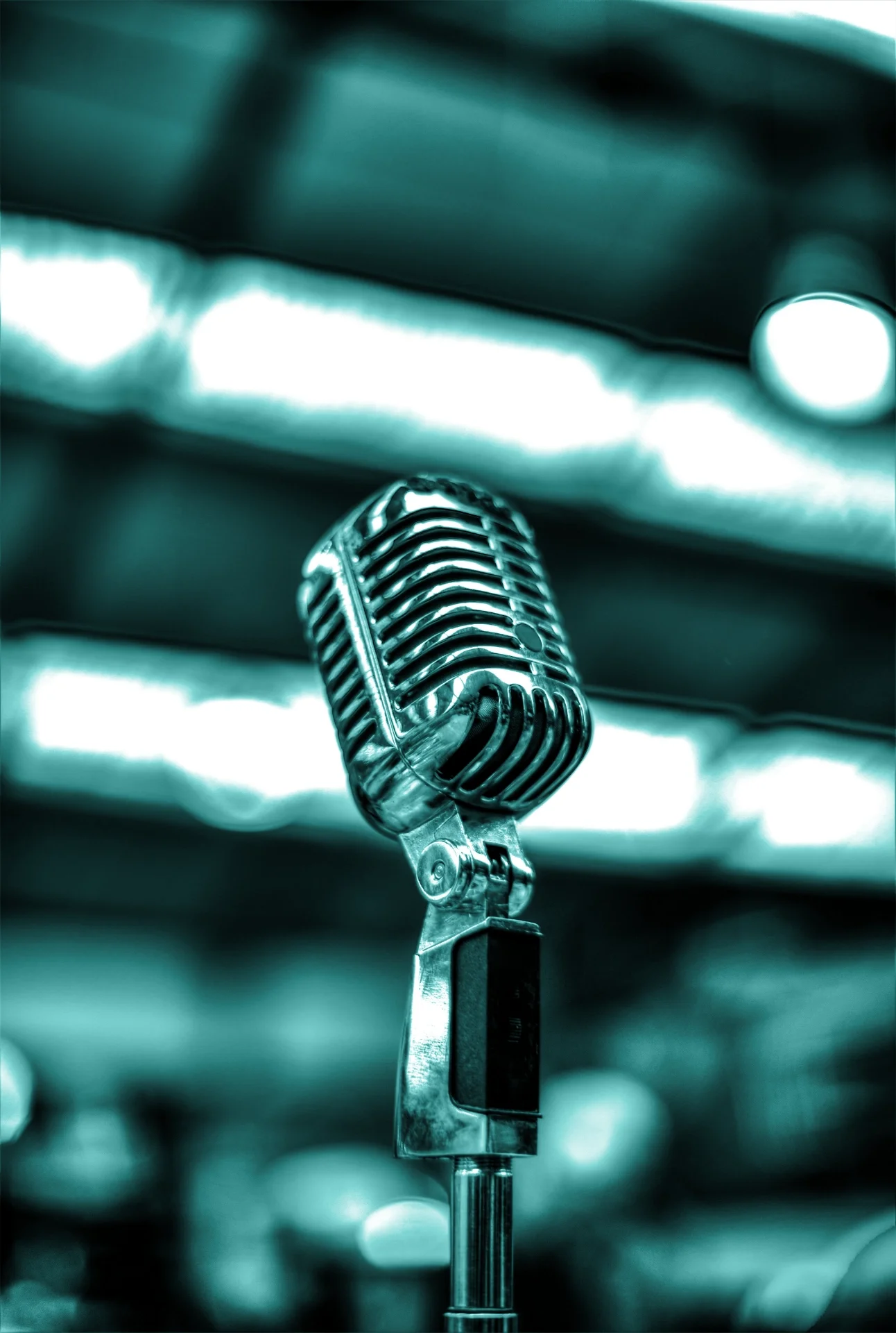 Vintage microphone representing Kerry Christie’s inspirational guest speaking on self-love and healing