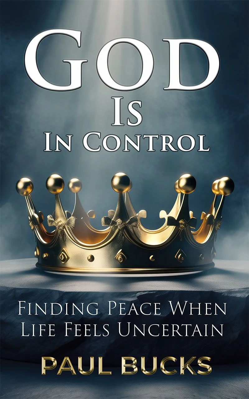 A book cover titled 'God Is In Control' with a gold crown and the subtitle 'Finding Peace When Life Feels Uncertain' by Paul Bucks.