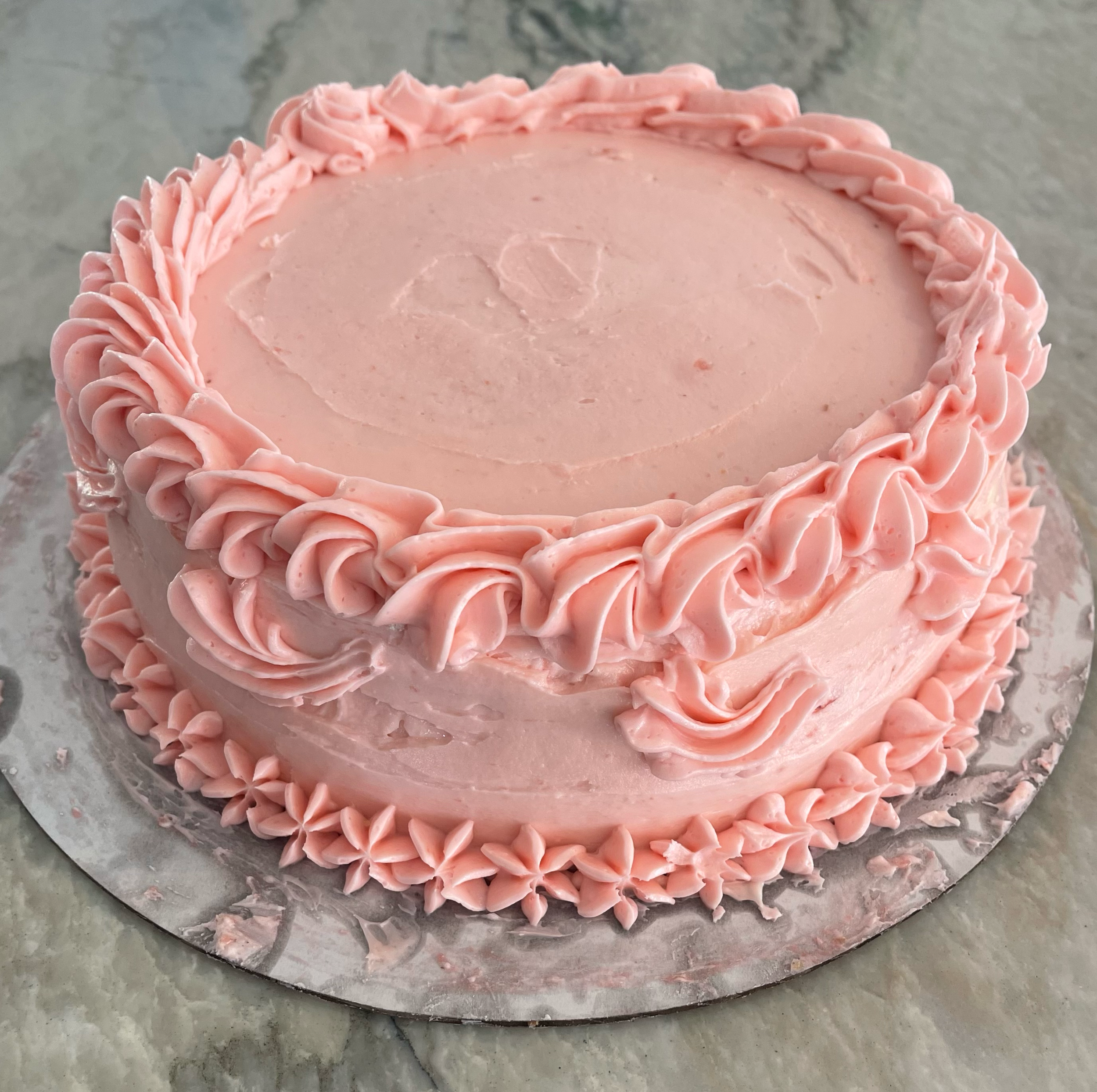 Cake (price range $30-$70 based on design, flavor, and size)