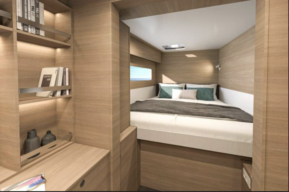 Interior of a small bedroom with wooden paneling, a bed with bed linens, pillows, and a small window with a view of the sky.