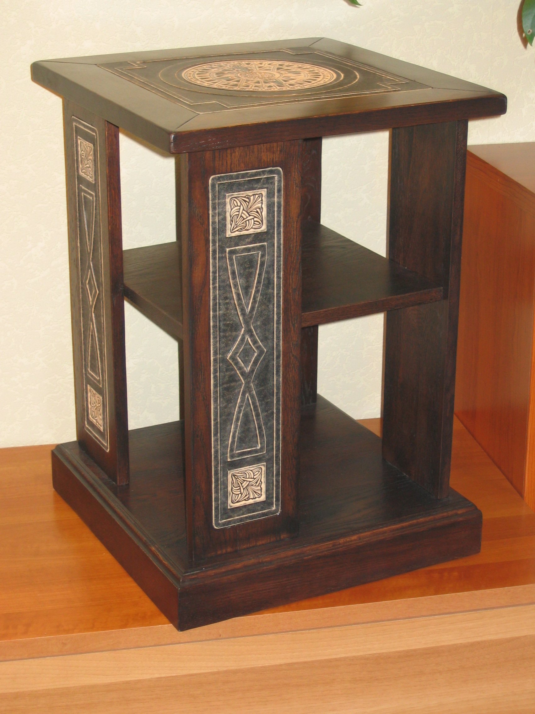 Tiered seating platforms with matched hardwood trim for private cinema.