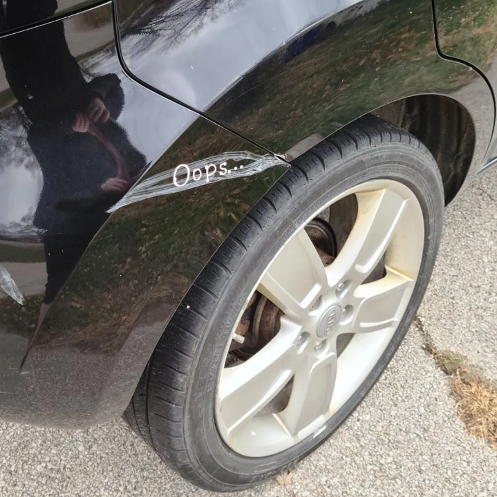 This is how I "fixed" the scrape I put in my car. White permanent vinyl cut on a Cricut.