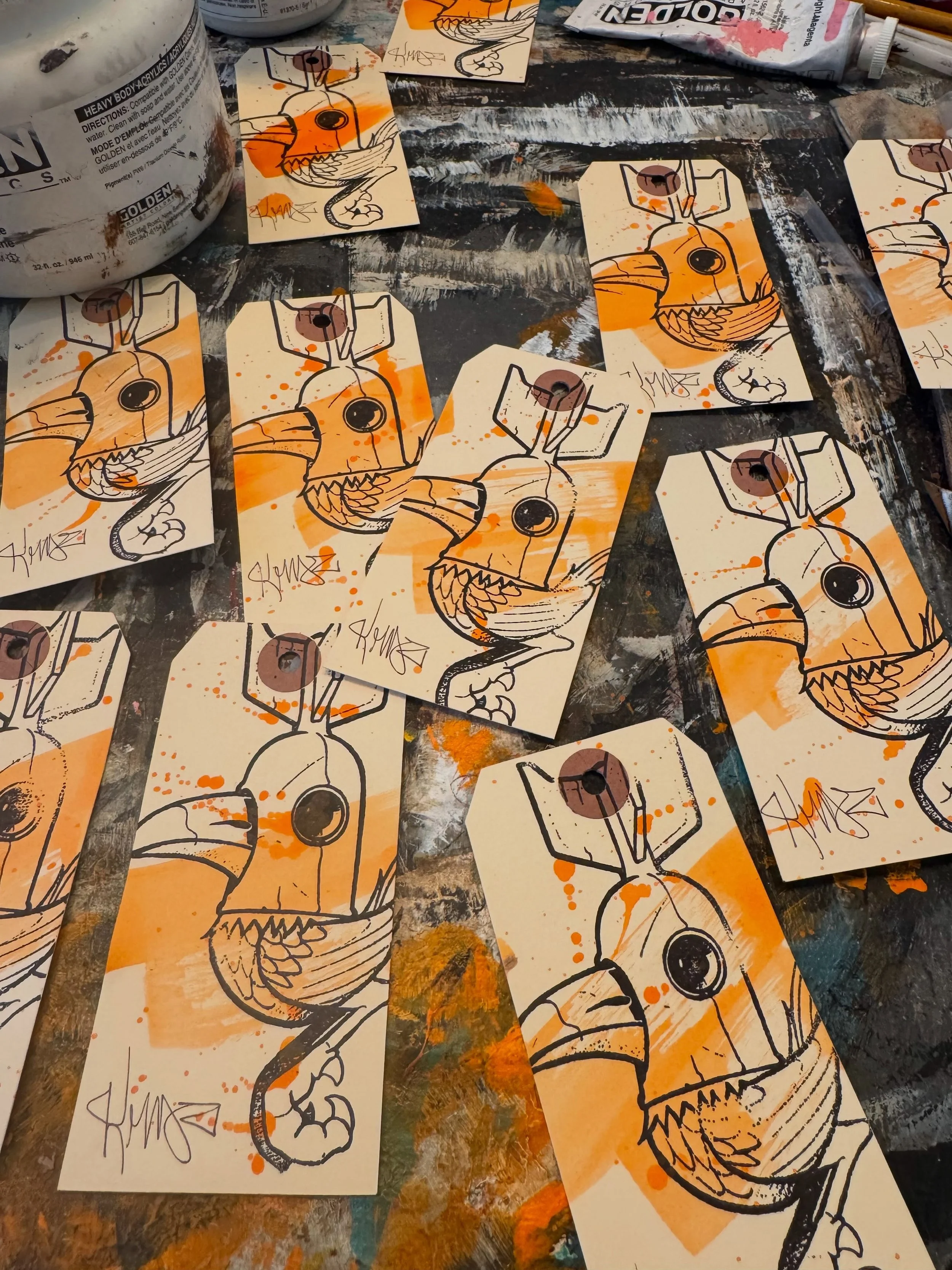 Working on hand made inclusions for the upcoming print release. Signed Atomic Bird Manila tags with each print! #staticmedium #artprint #kmndz