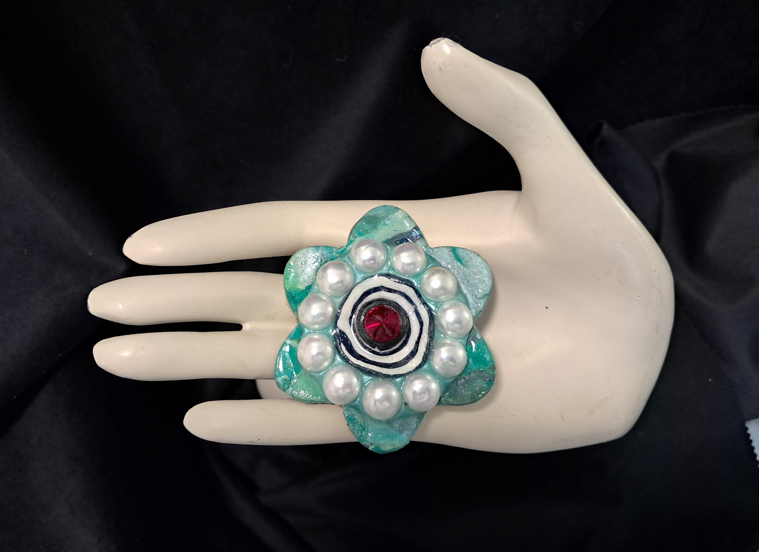 Pearl circle brooch hand.jpg