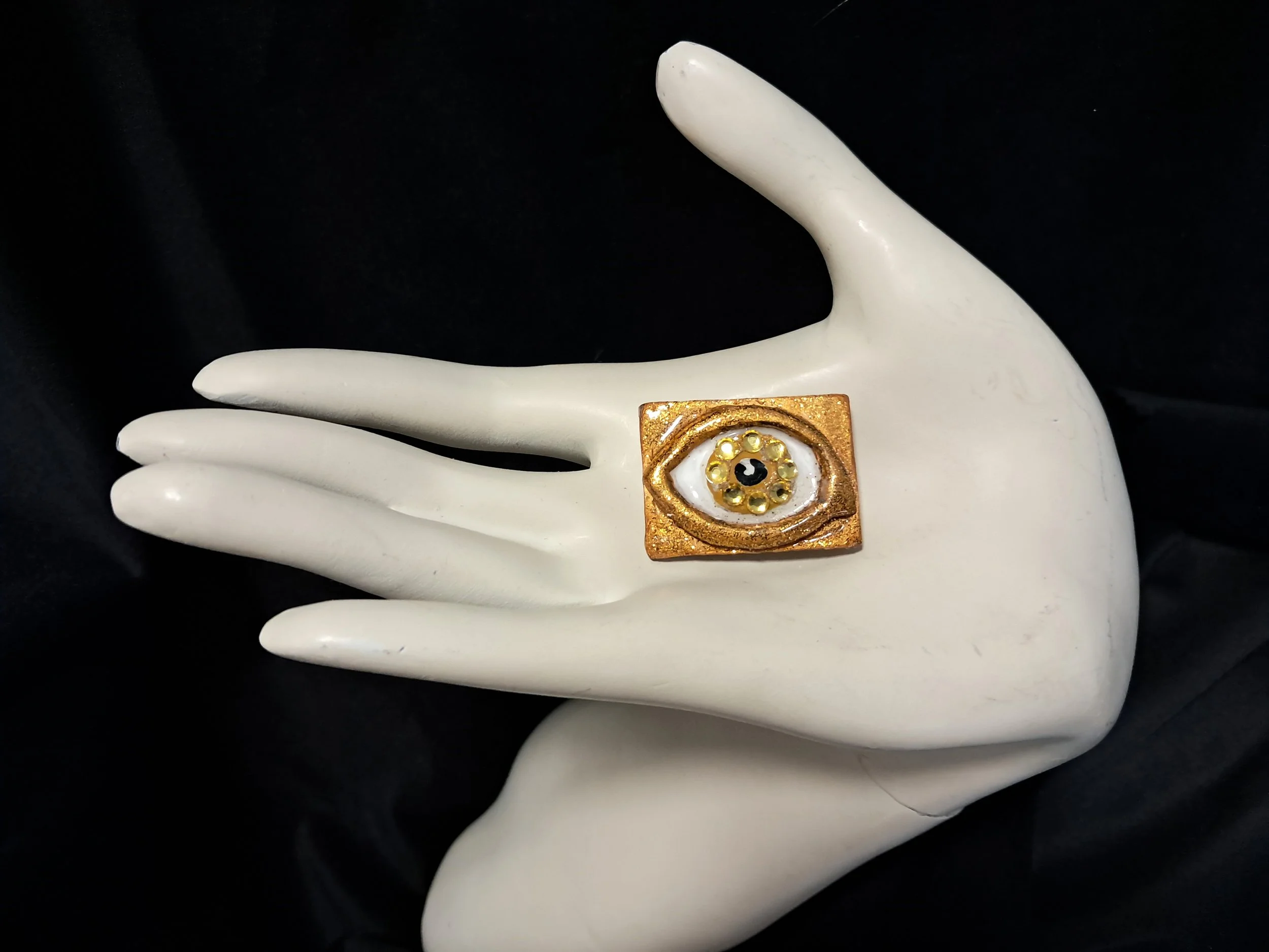 Golden Eye Brooch with Crystals