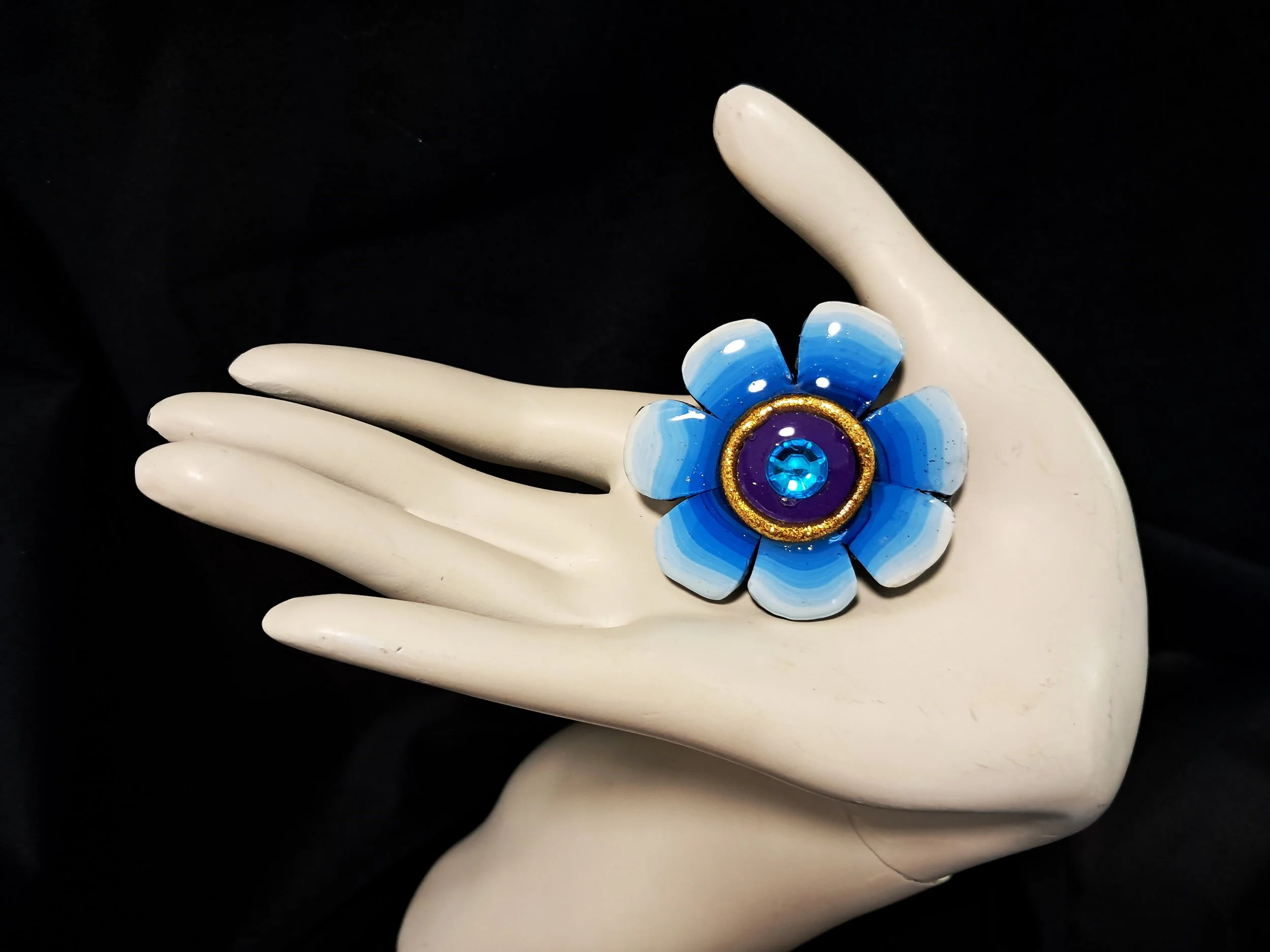 modern blue flower with crystal hand.jpg