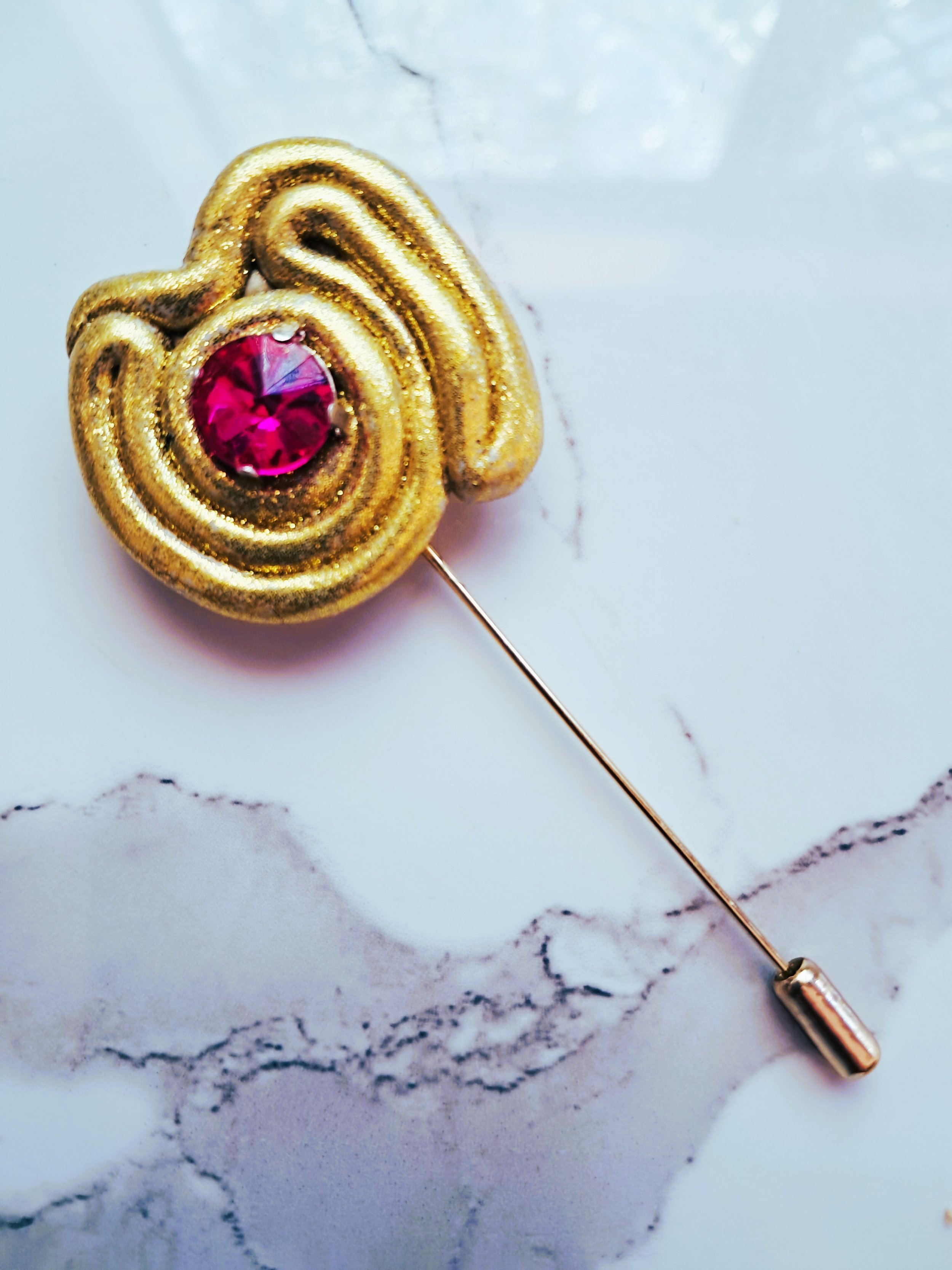 pink swirl pin granite.jpg