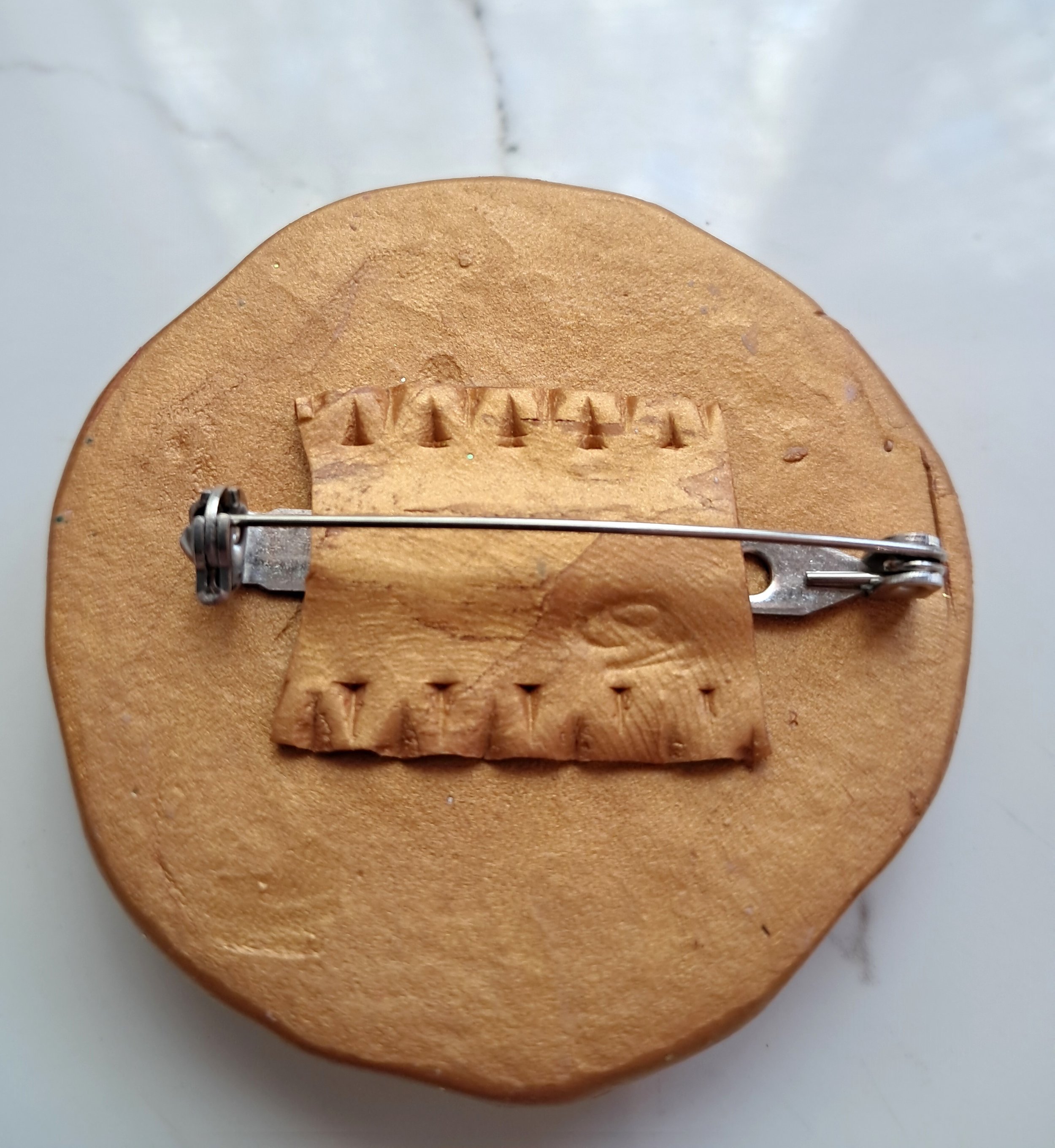 Round brooch rectangle crystals back.jpg