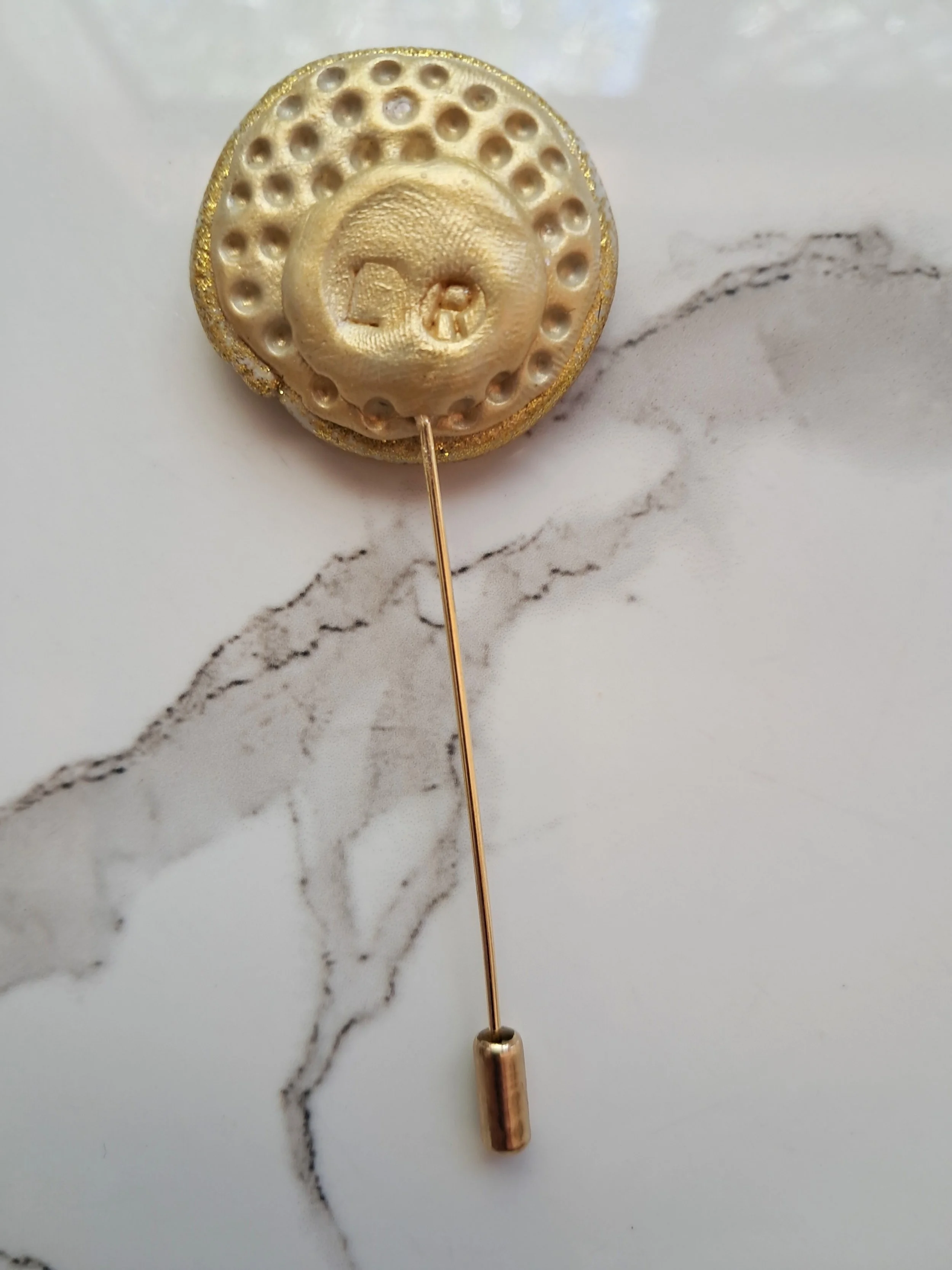 Blue swirl pin Back.jpg