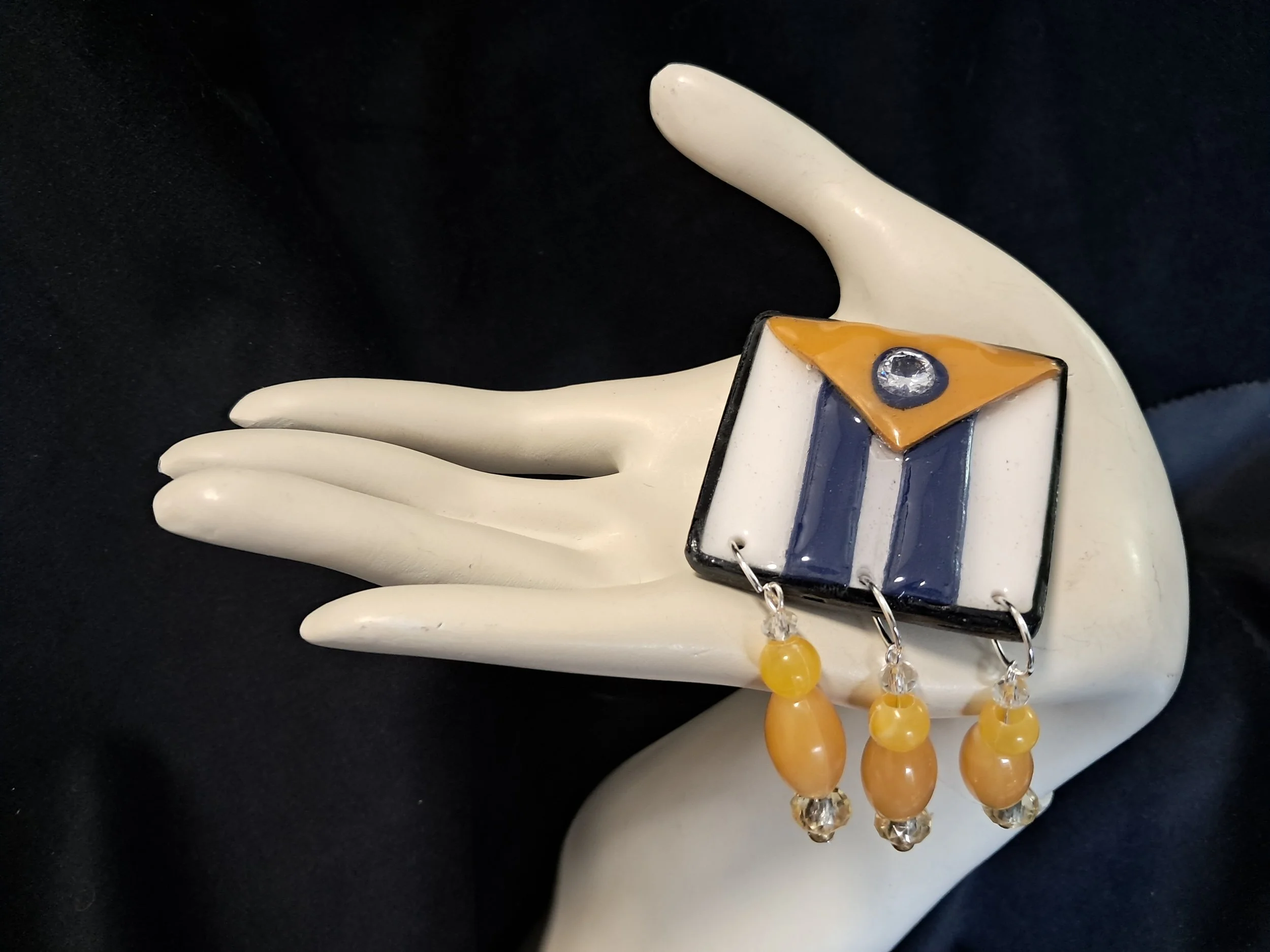 geom bw y beads hand.jpg