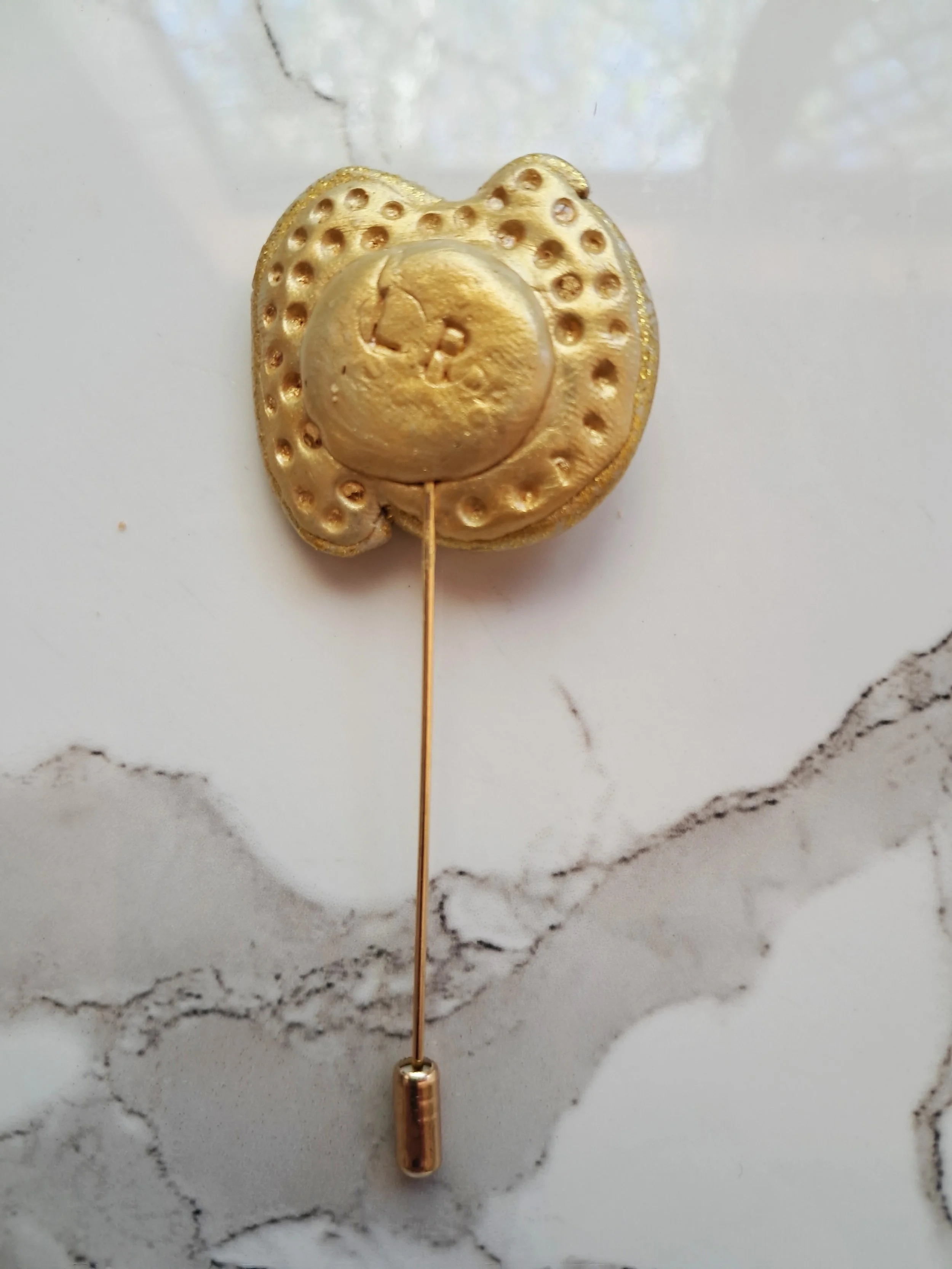 pink swirl pin back.jpg