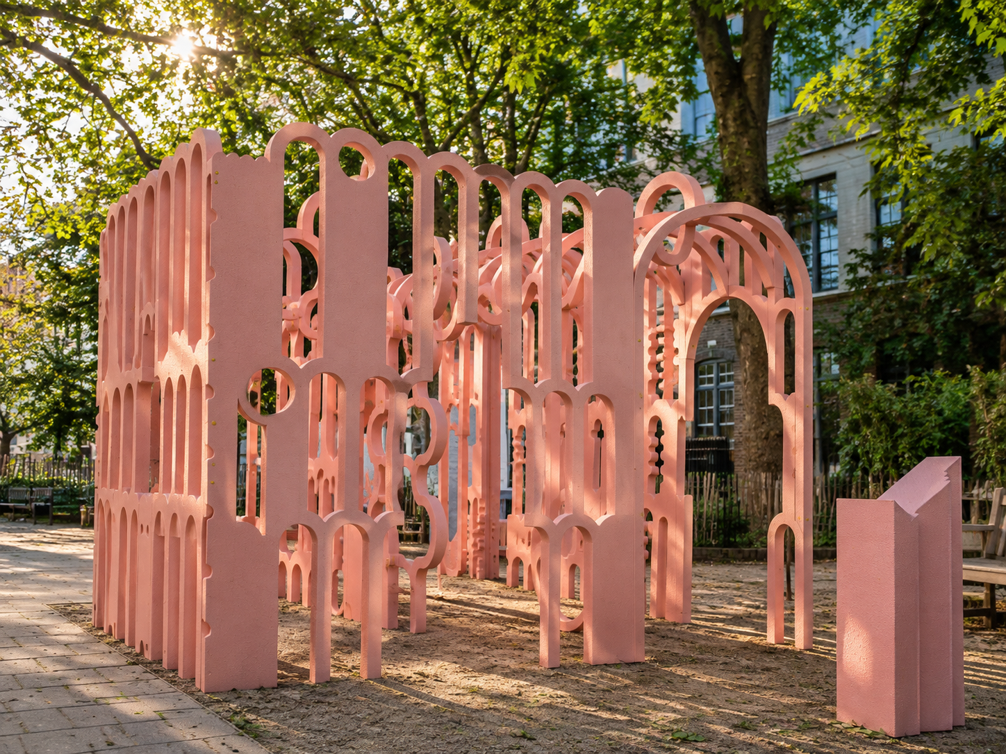The Possible Impossible Pavilion by Peter Morris Architects, featuring sculptural pink arches in London