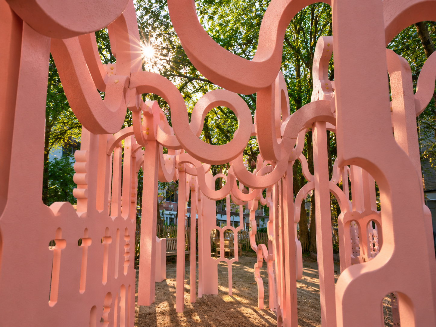 Sculptural pink arches inside the Possible Impossible Pavilion by Peter Morris Architects