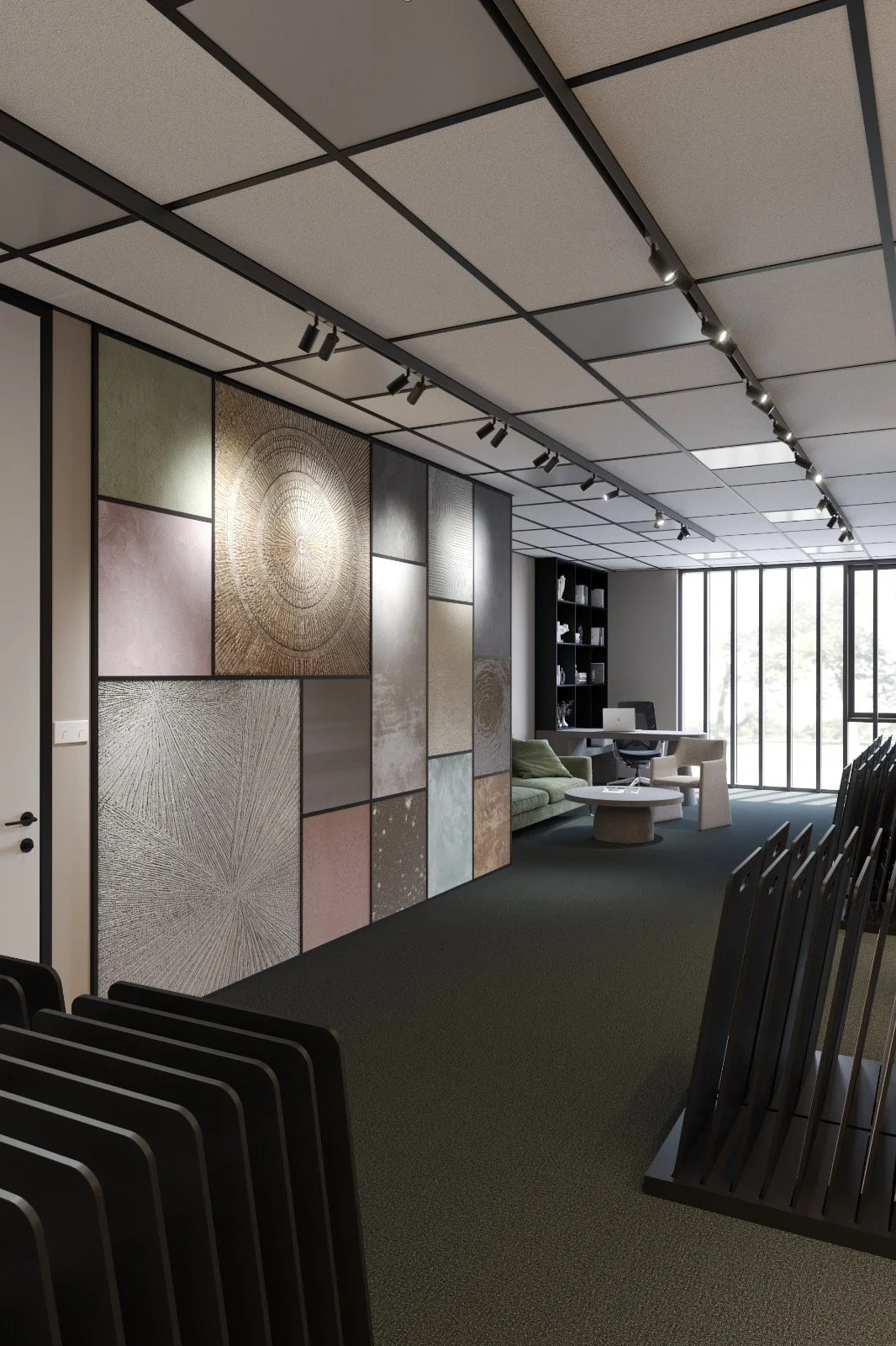 Modern office space with a wall decorated with textured, geometric art panels, a green sofa, a white chair, a round coffee table, a black bookshelf, and large floor-to-ceiling windows.