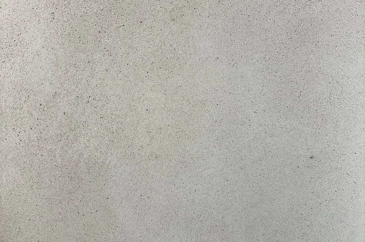 ART STONE sculptural stone plaster sample, rock-face texture in Natural Beige — Elf Decor · ART STONE aged lime plaster sample, layered sedimentary stone effect — Elf Decor
