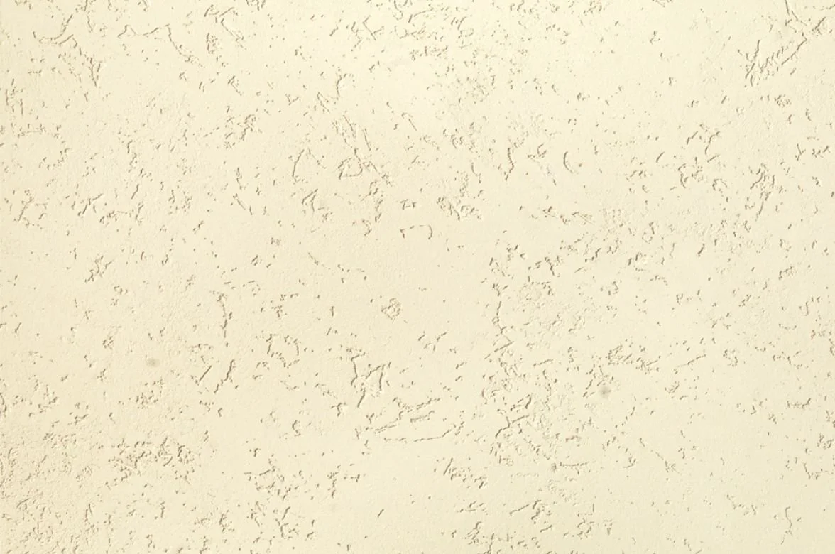 CASTELLO FINE fine-grain travertine coating sample, smooth honed texture in Light Beige — Elf Decor · CASTELLO FINE travertine finish sample, soft banded effect in Natural White — Elf Decor