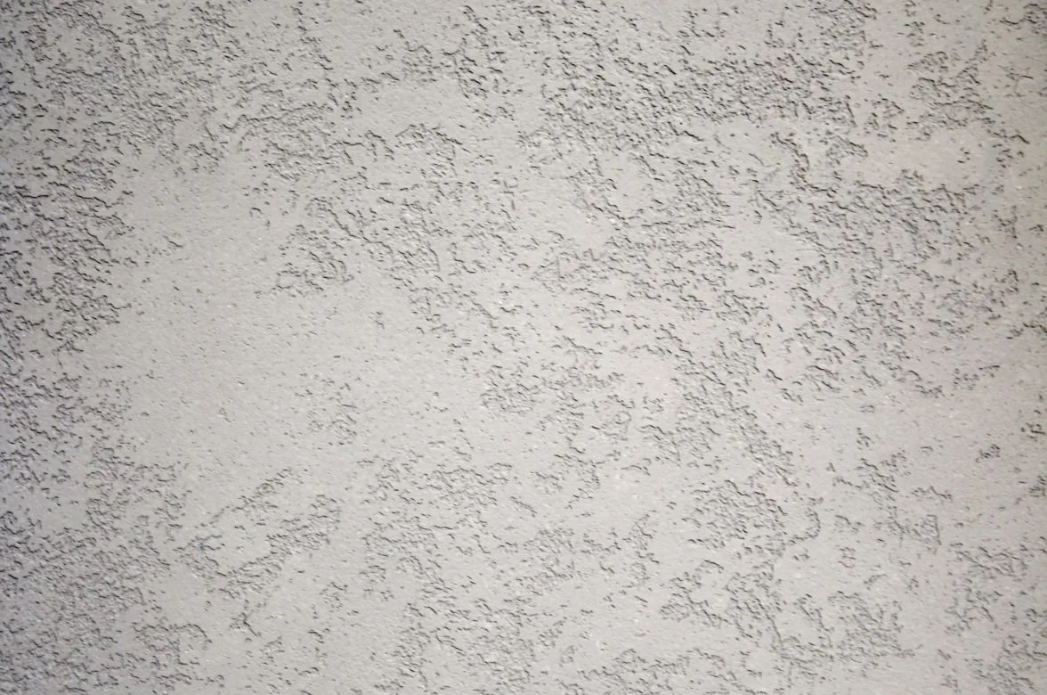 CASTELLO FINE fine-grain travertine coating sample, smooth honed texture in Light Beige — Elf Decor · CASTELLO FINE travertine finish sample, soft banded effect in Natural White — Elf Decor