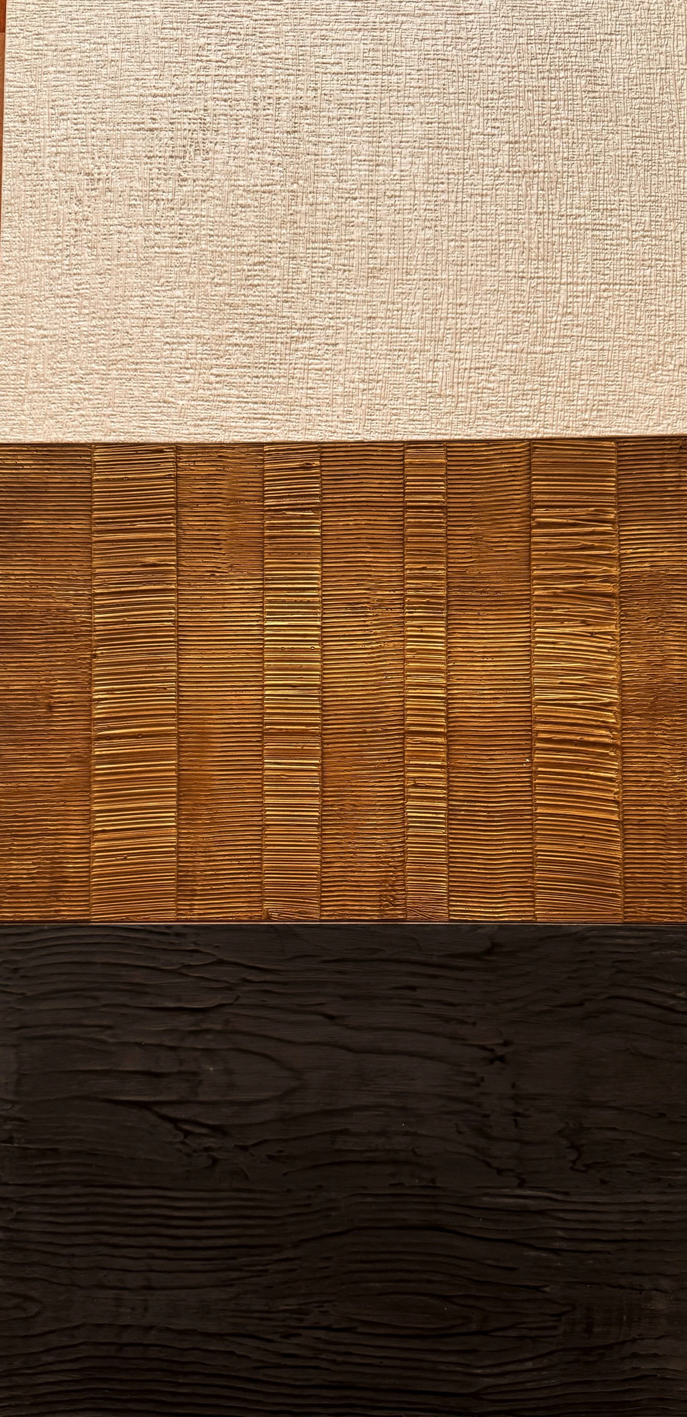 Close-up of three textured surfaces: beige fabric, woven bamboo, and dark wood.