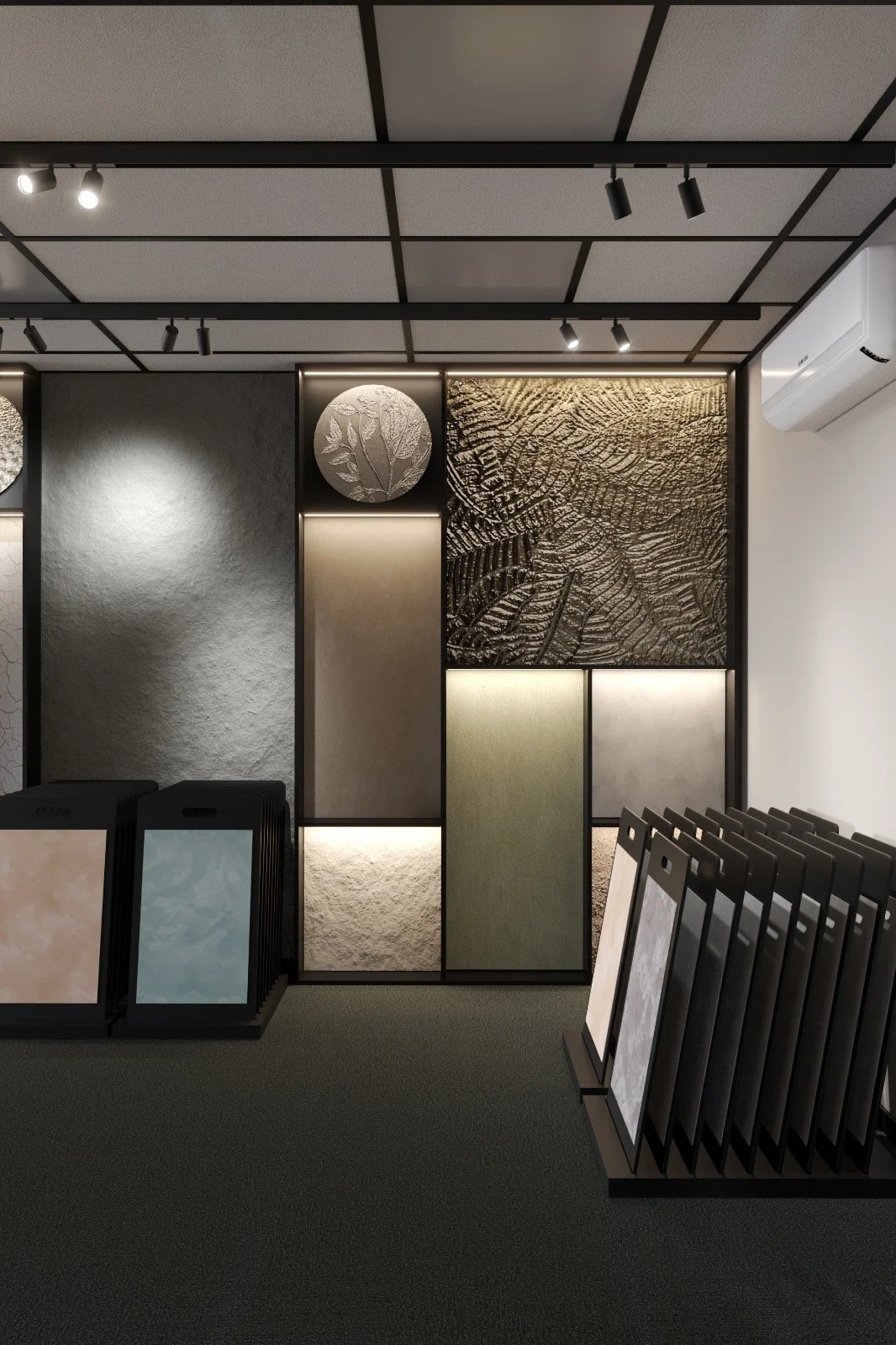 Decorative wall display with textured panels and lighting, with sample tiles or materials on stands in a showroom setting.