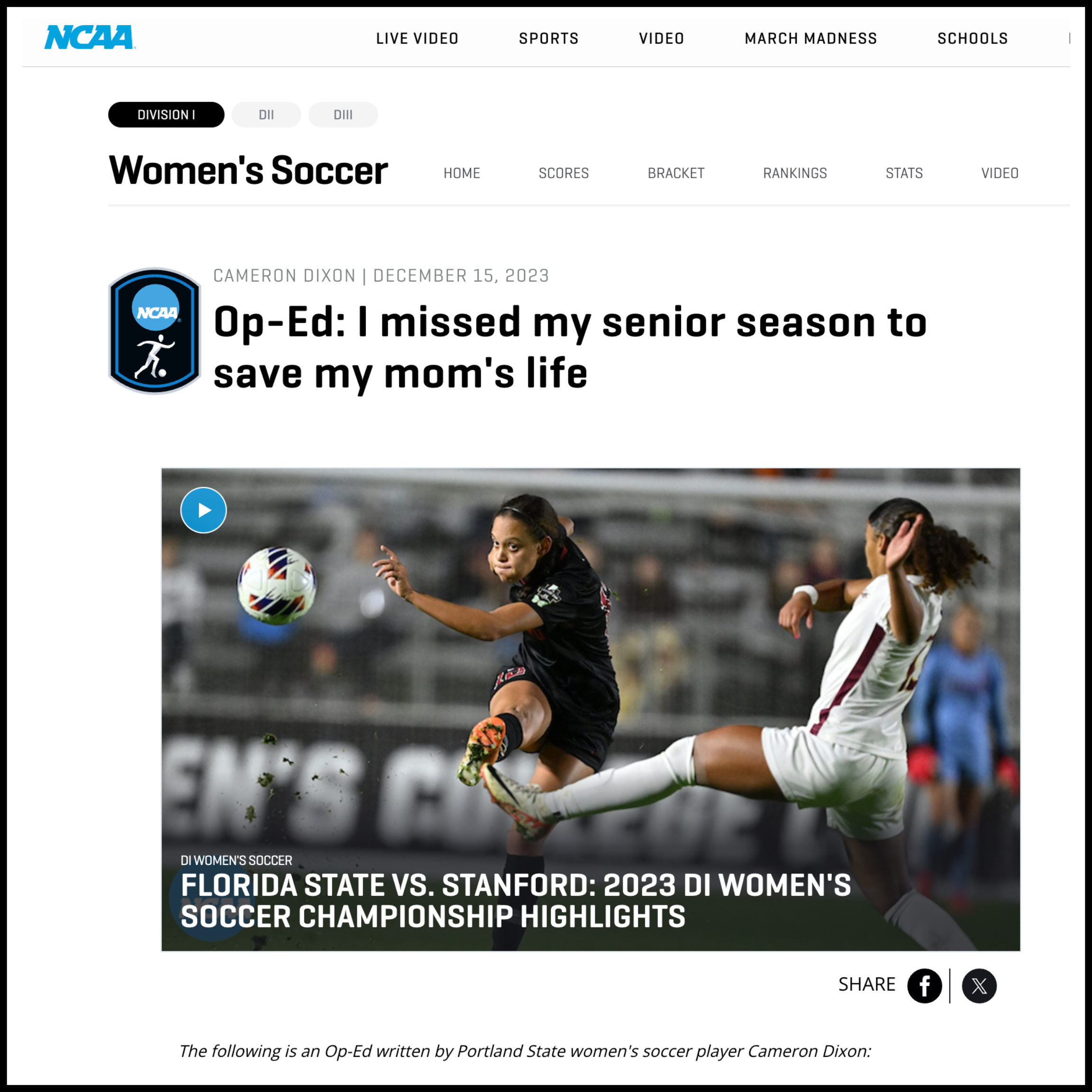 Photograph of two women soccer players in action during a match, with one player in black and the other in white. The black-uniformed player is kicking the ball while the white-uniformed player slides to block. The scene takes place on a lit field wi