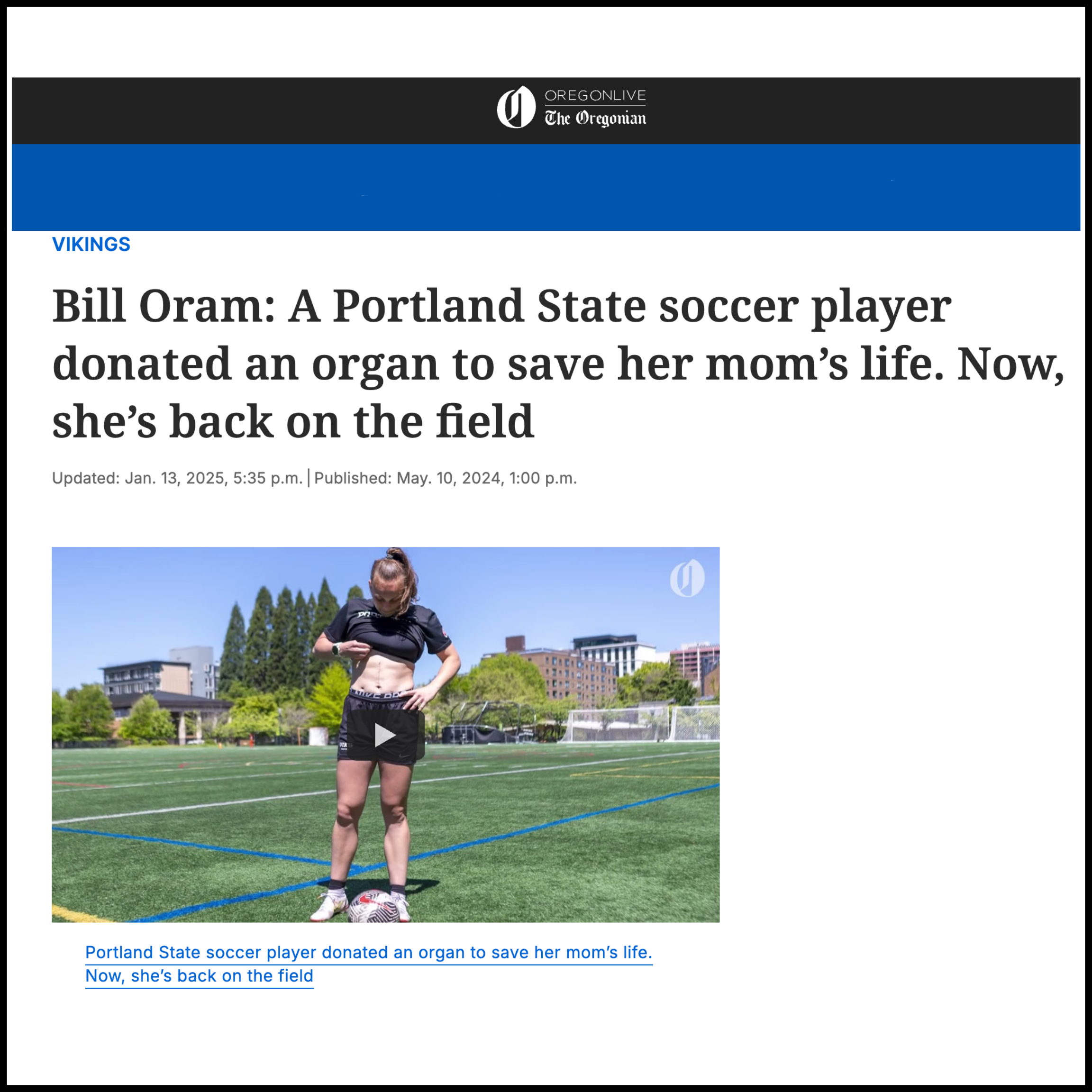 A female soccer player standing on a soccer field with a soccer ball at her feet, adjusting her shirt, during daytime.