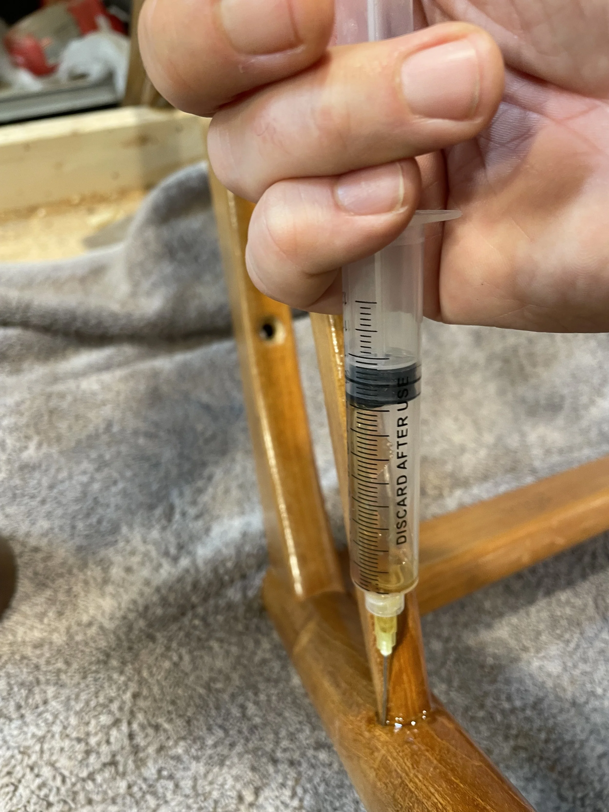 Hot hide glue injected into joints that move, but won't come out. 