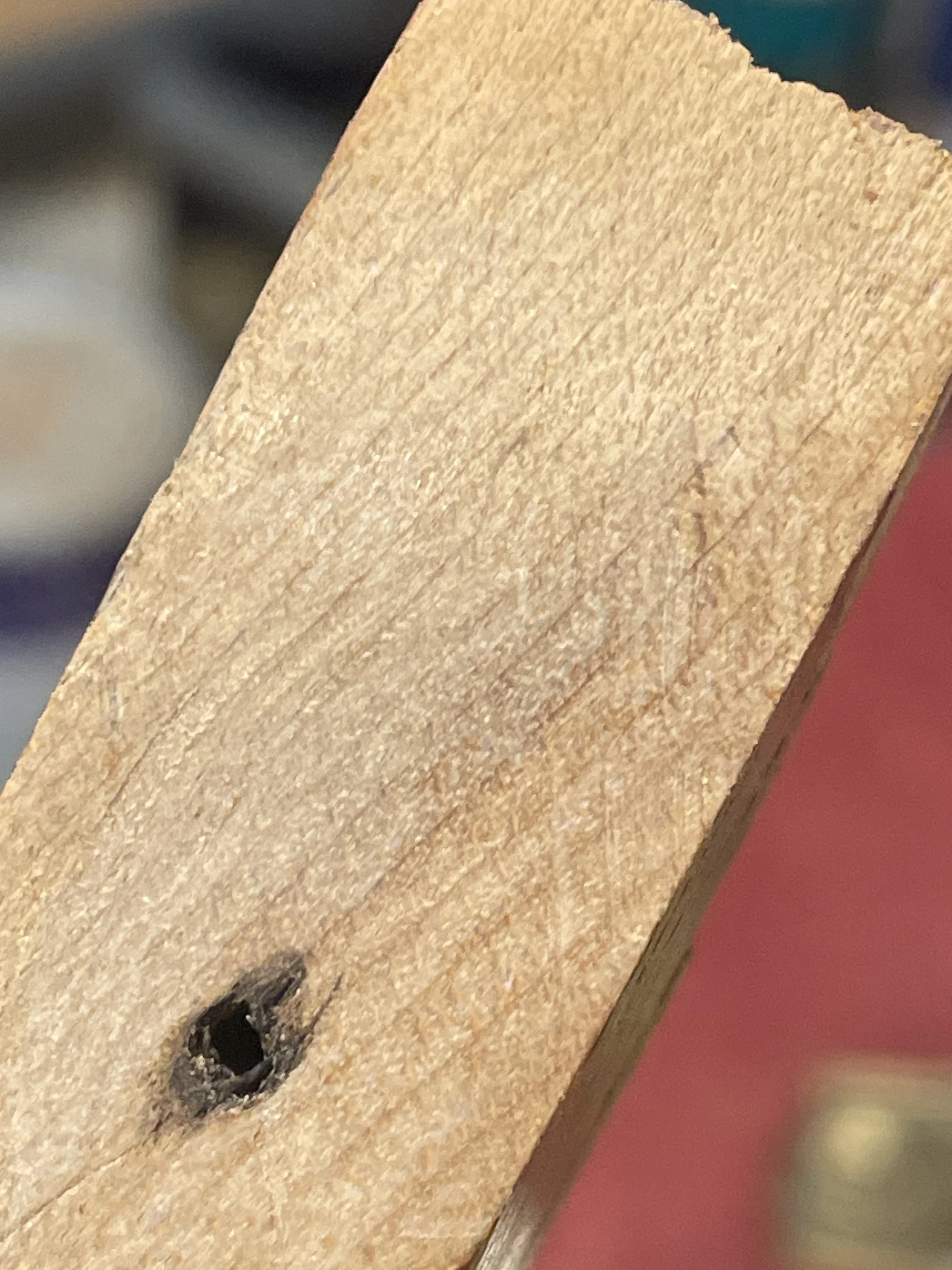 Cutting a clean, flat surface to get ready to glue a new piece of wood