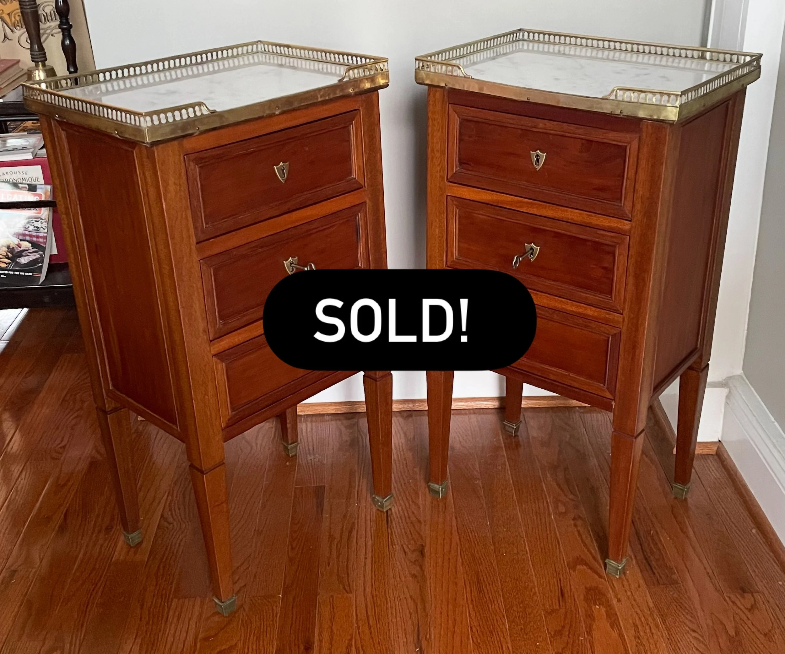 Pair of French galleried nightstands in walnut